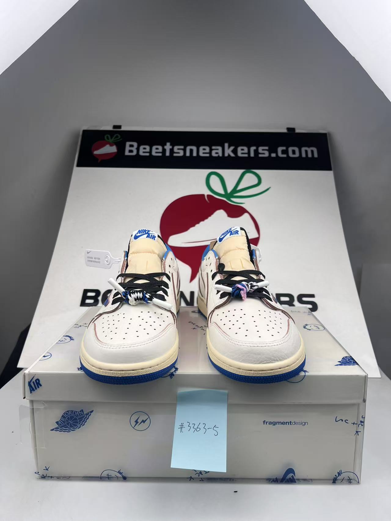 Front QC archive photo of Fragment Design x Travis Scott x Air Jordan 1 Retro Low OG SP “Sail Military Blue” replicas