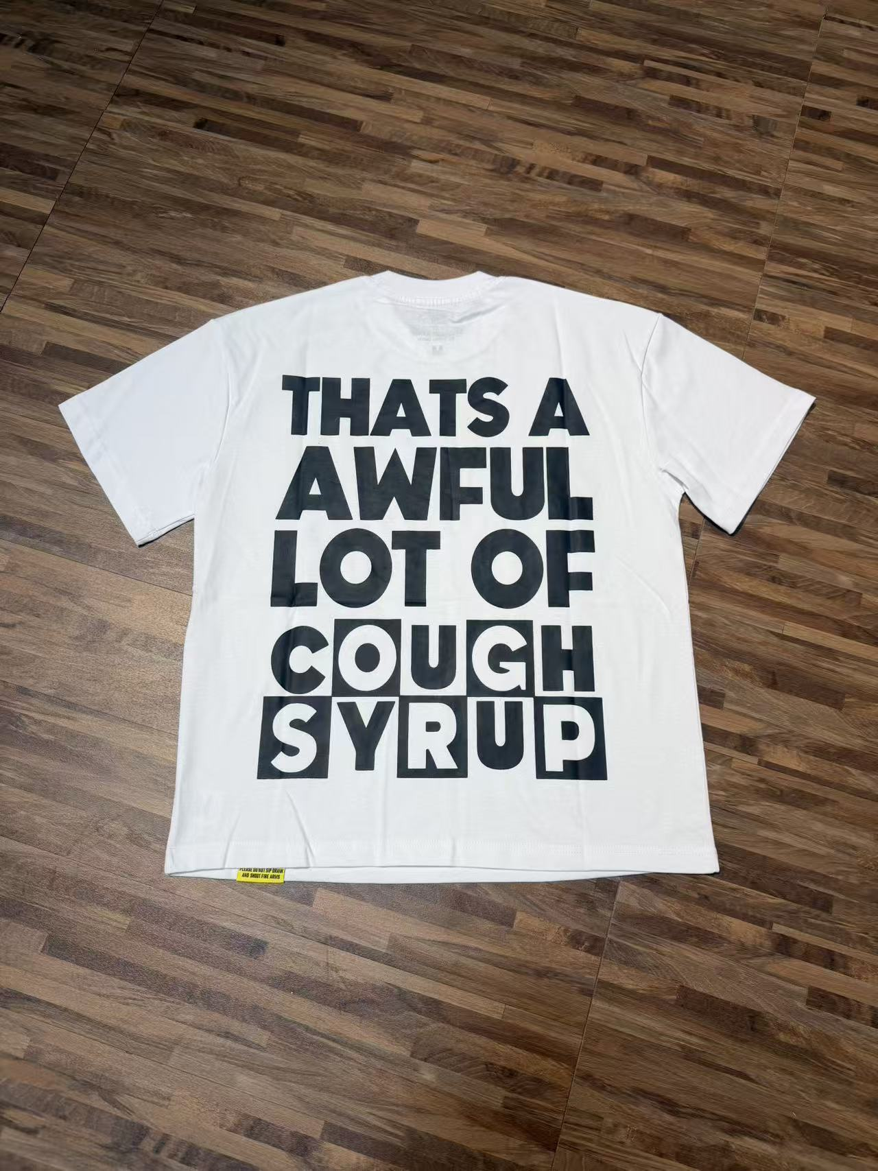 Black bold statement with enlarged logo print short-sleeved shirt