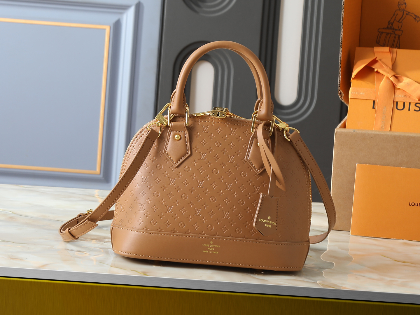 LV Alma Top Handle Bag