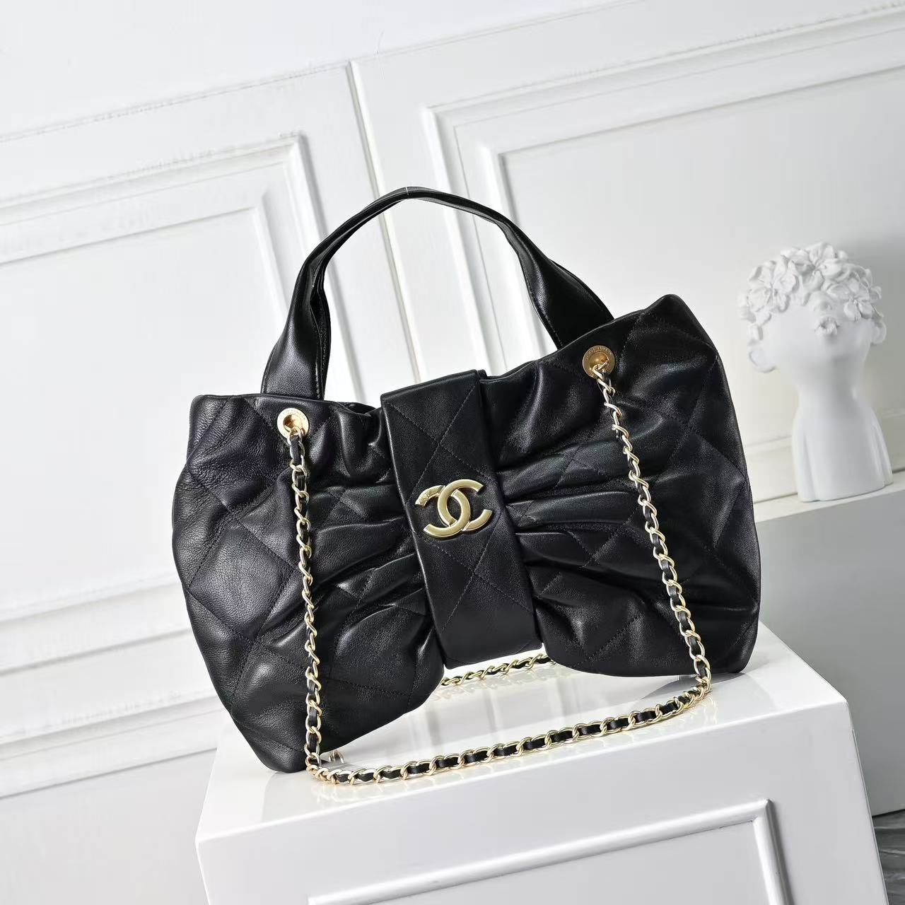 Chanel bow-design waxed lambskin leather handbag