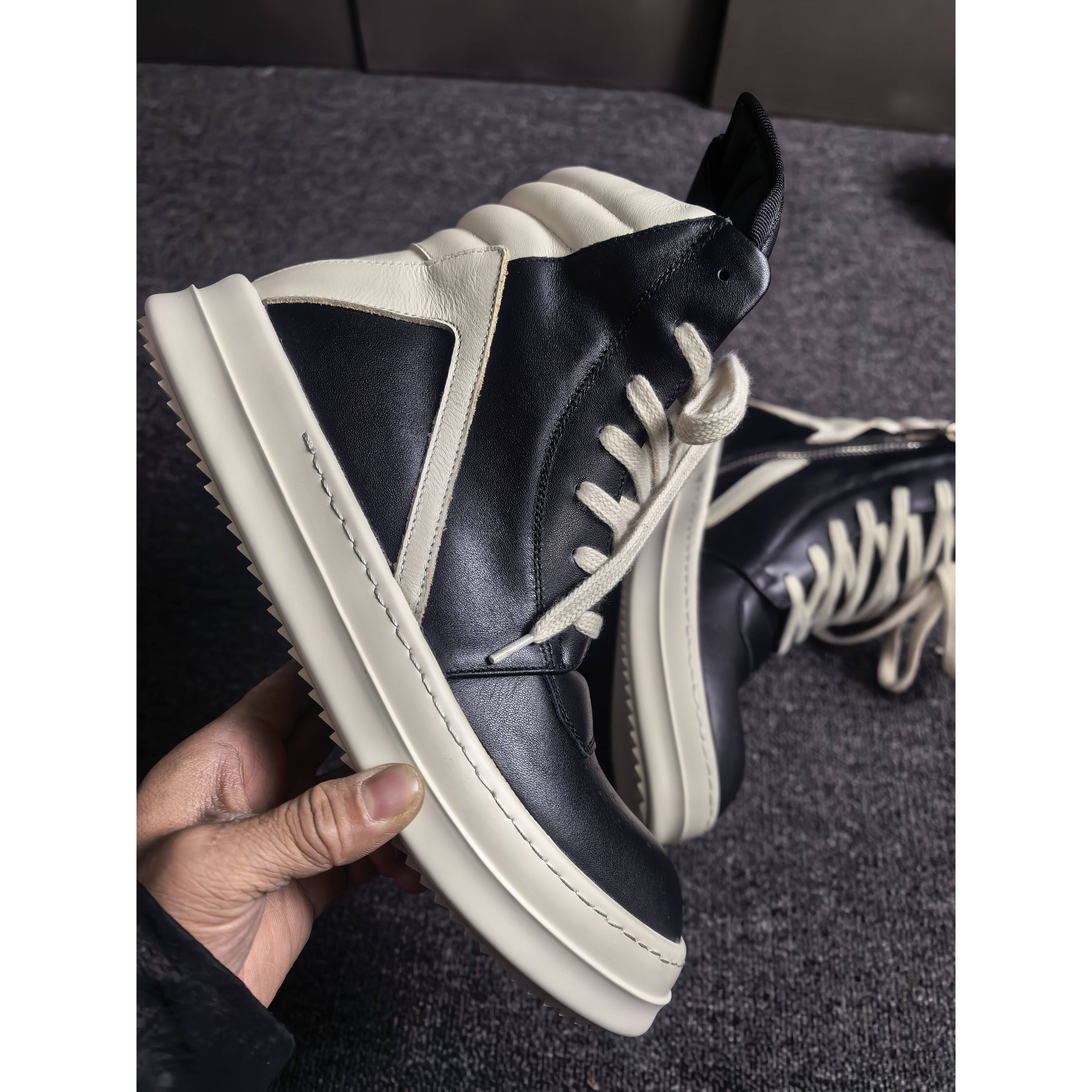 RO Inverted triangle style main strap leather upper with creamy base and dark color high-top shoe