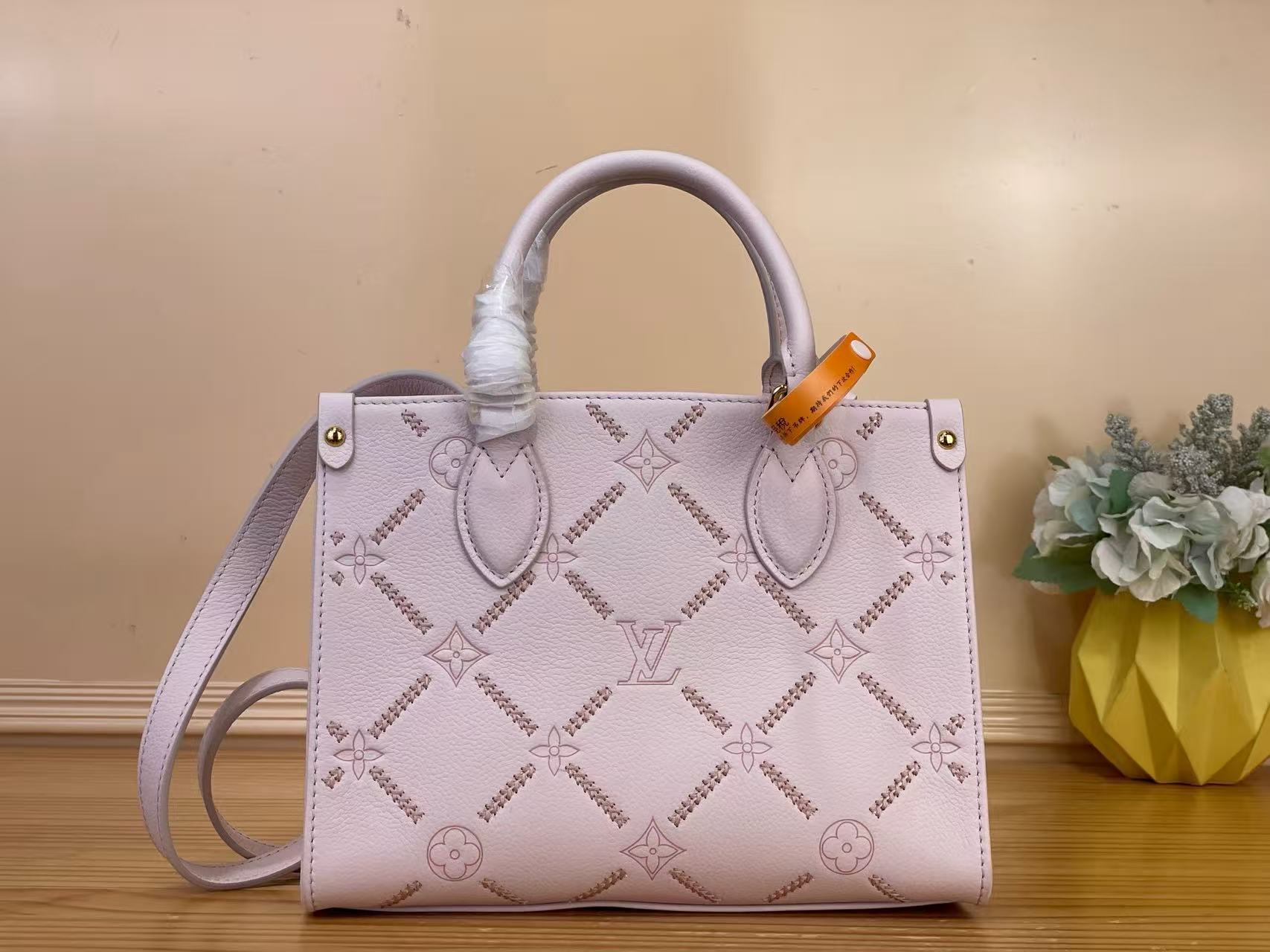LV new pink embroidered OnTheGo small handbag