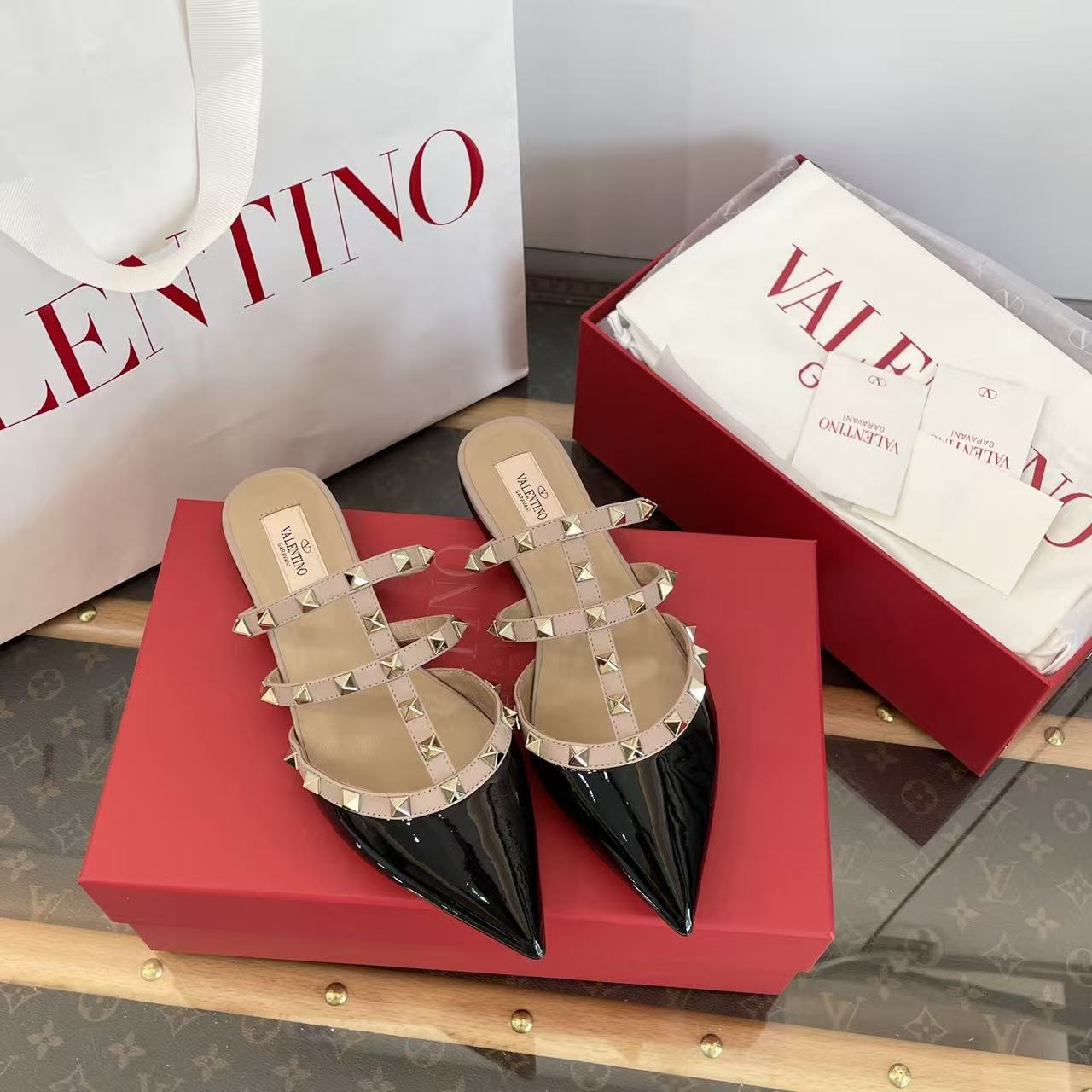 Valentino pointed rivet flat shoes