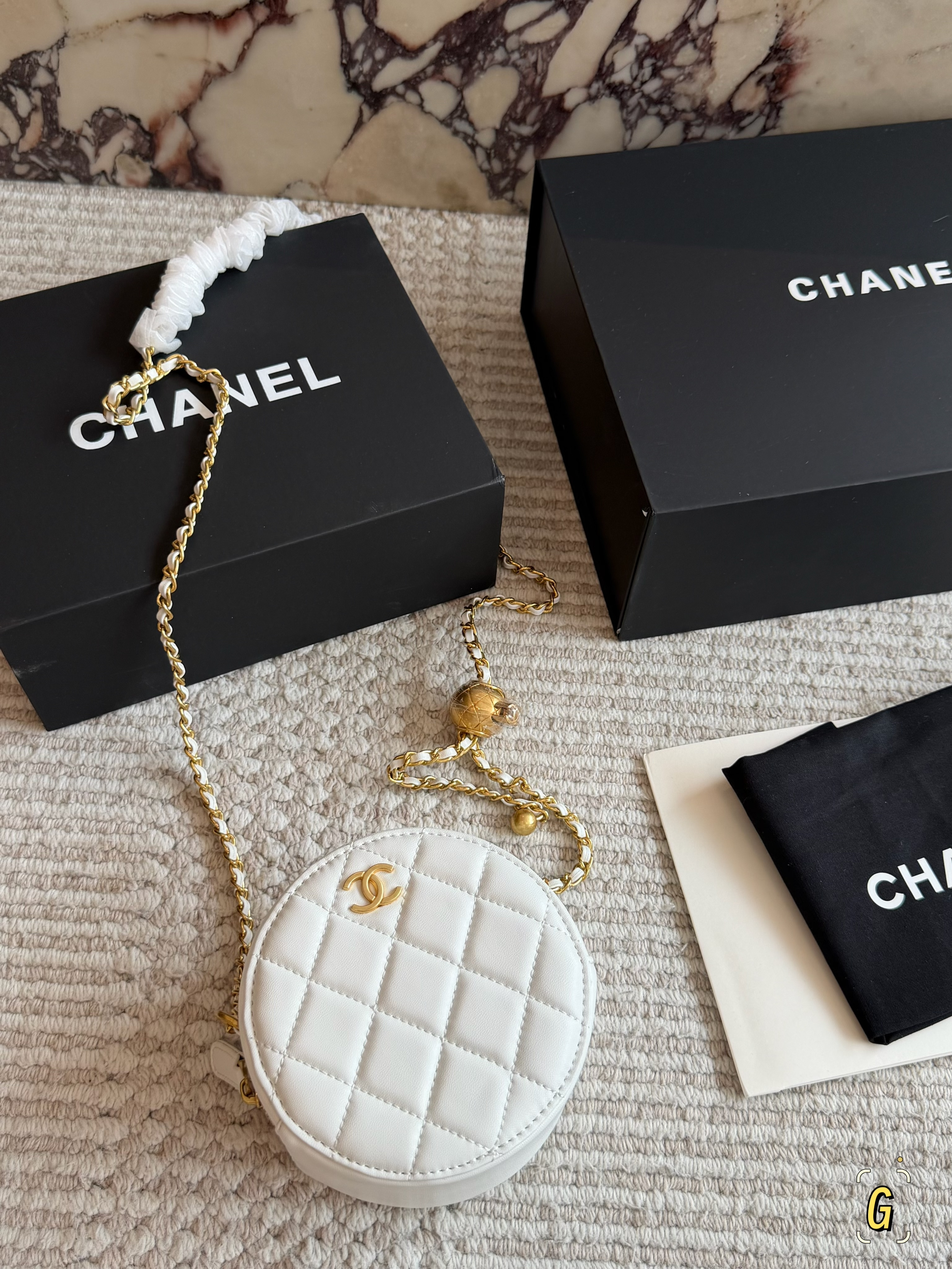 Chanel Gold-Ball Mini Round Bag