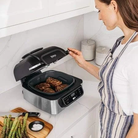 Restored Ninja AG300 Foodi 4-in-1 Indoor Grill with 4-Qt Air Fryer, Roast, Bake, & Cyclonic Grilling Technology, Black/Stainless (Refurbished)