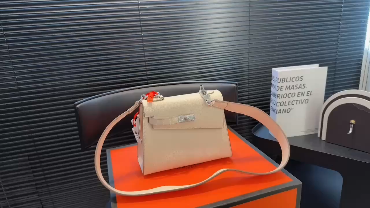 Hermès Kelly Milkshake White with Silver Hardware
