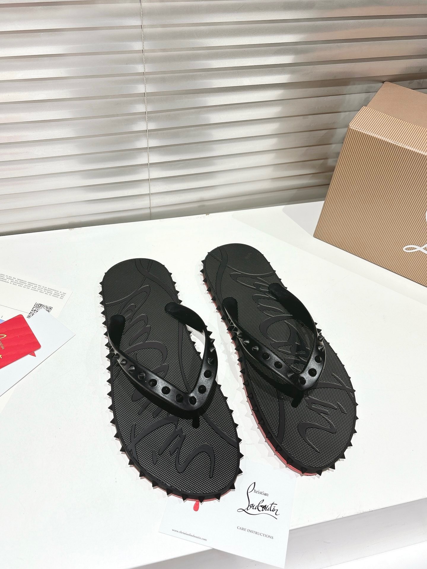 Christian Louboutin Loubi Flip Slide