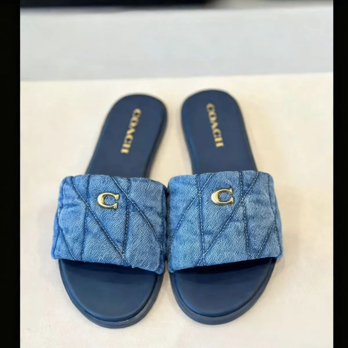 Coach letter diamond pattern casual shoes