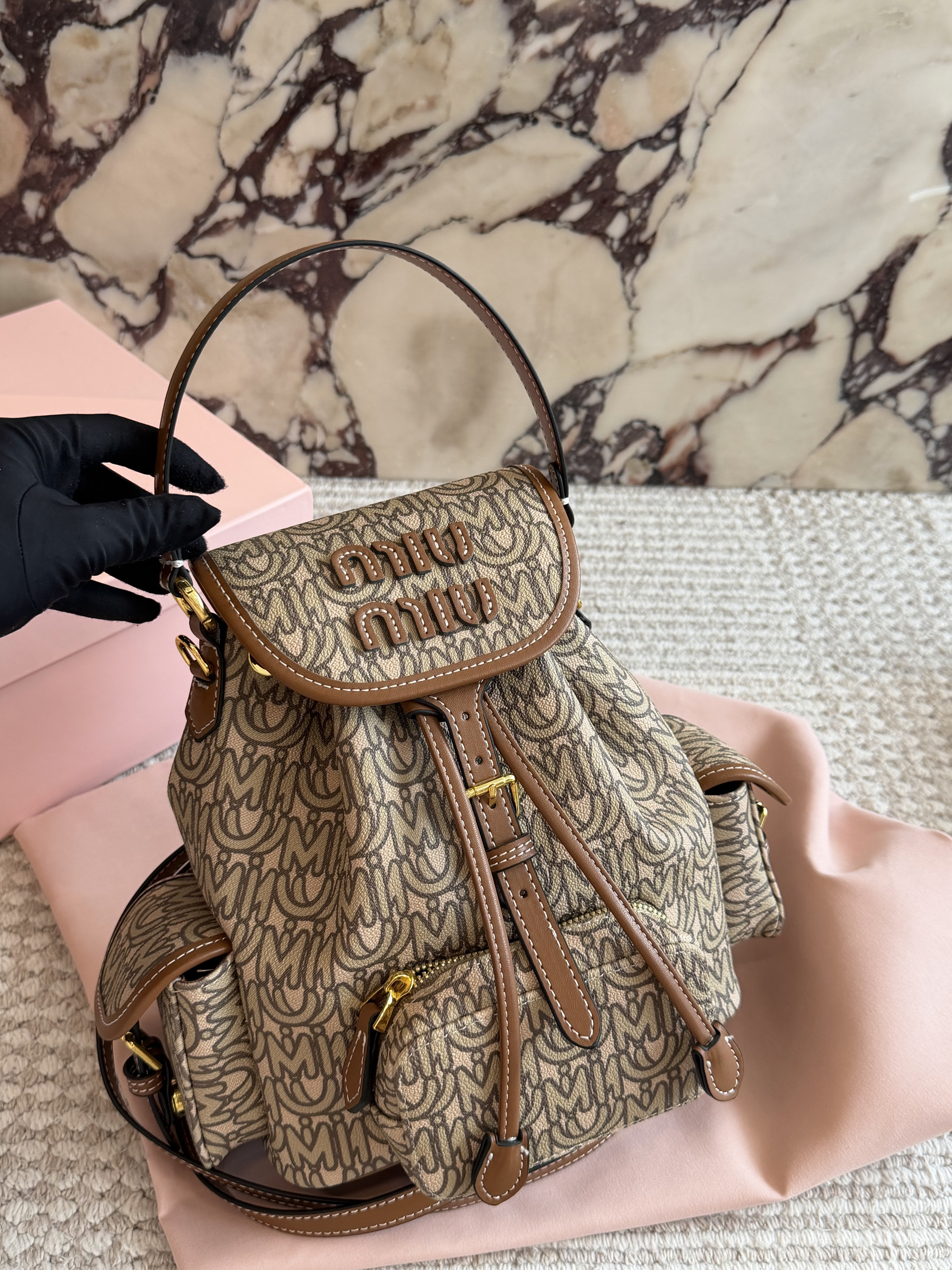 Miu Miu Stylish and Practical Backpacks