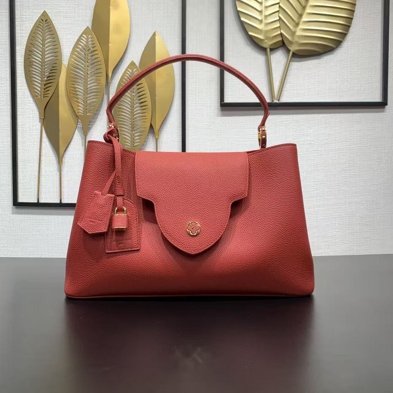 LV New Capucines Handbag in Red