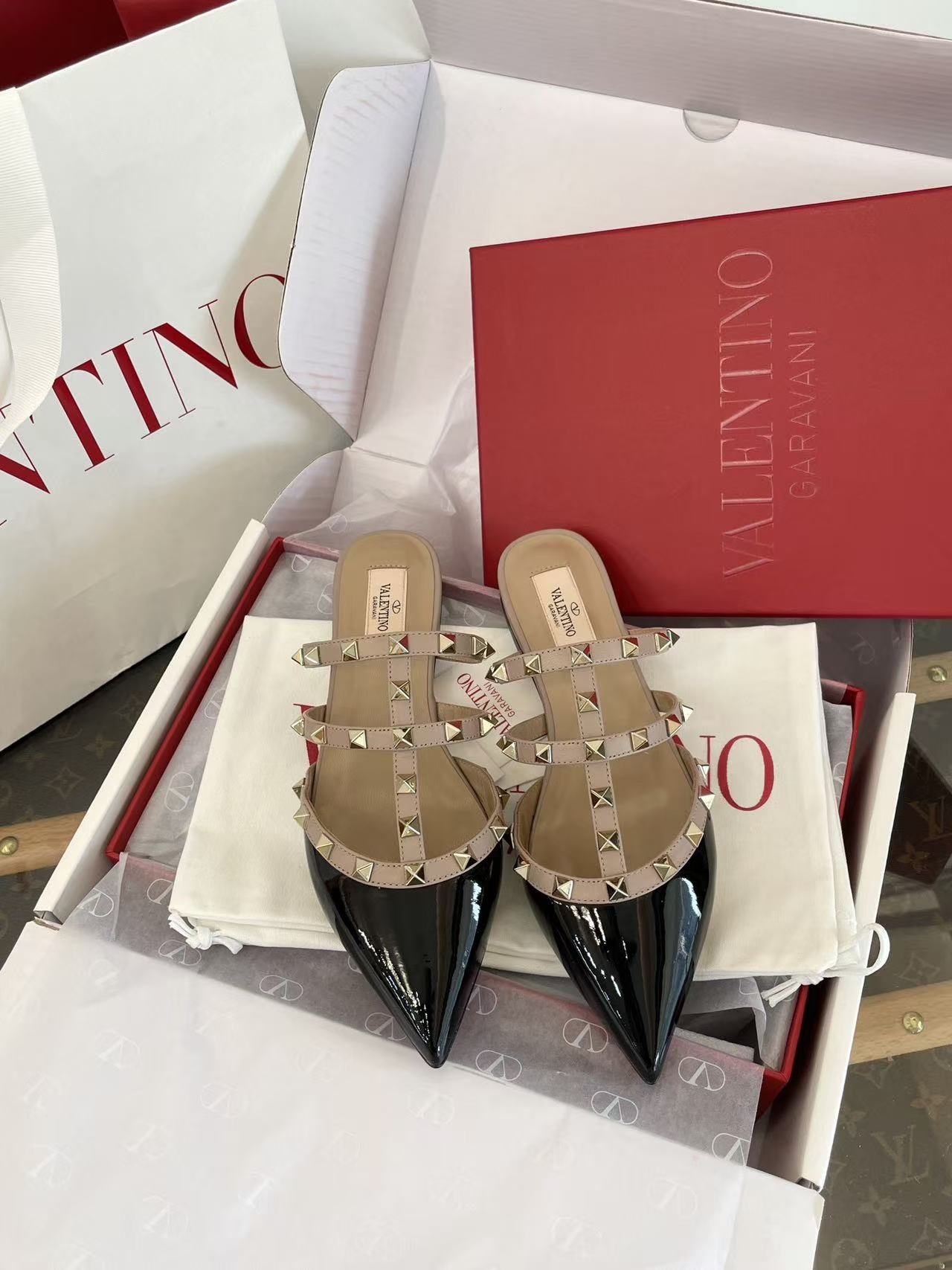Valentino pointed rivet flat shoes