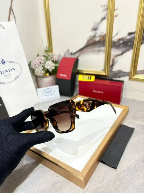 Prada sunglasses 61