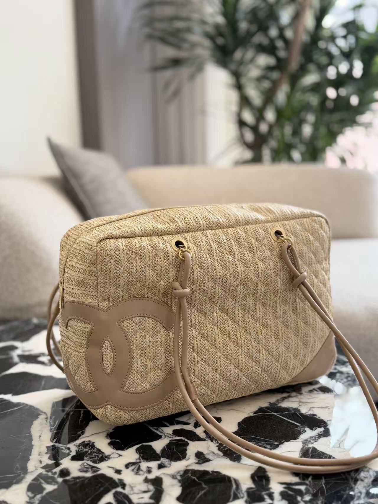 Chanel woven bowling bag crossbody bag