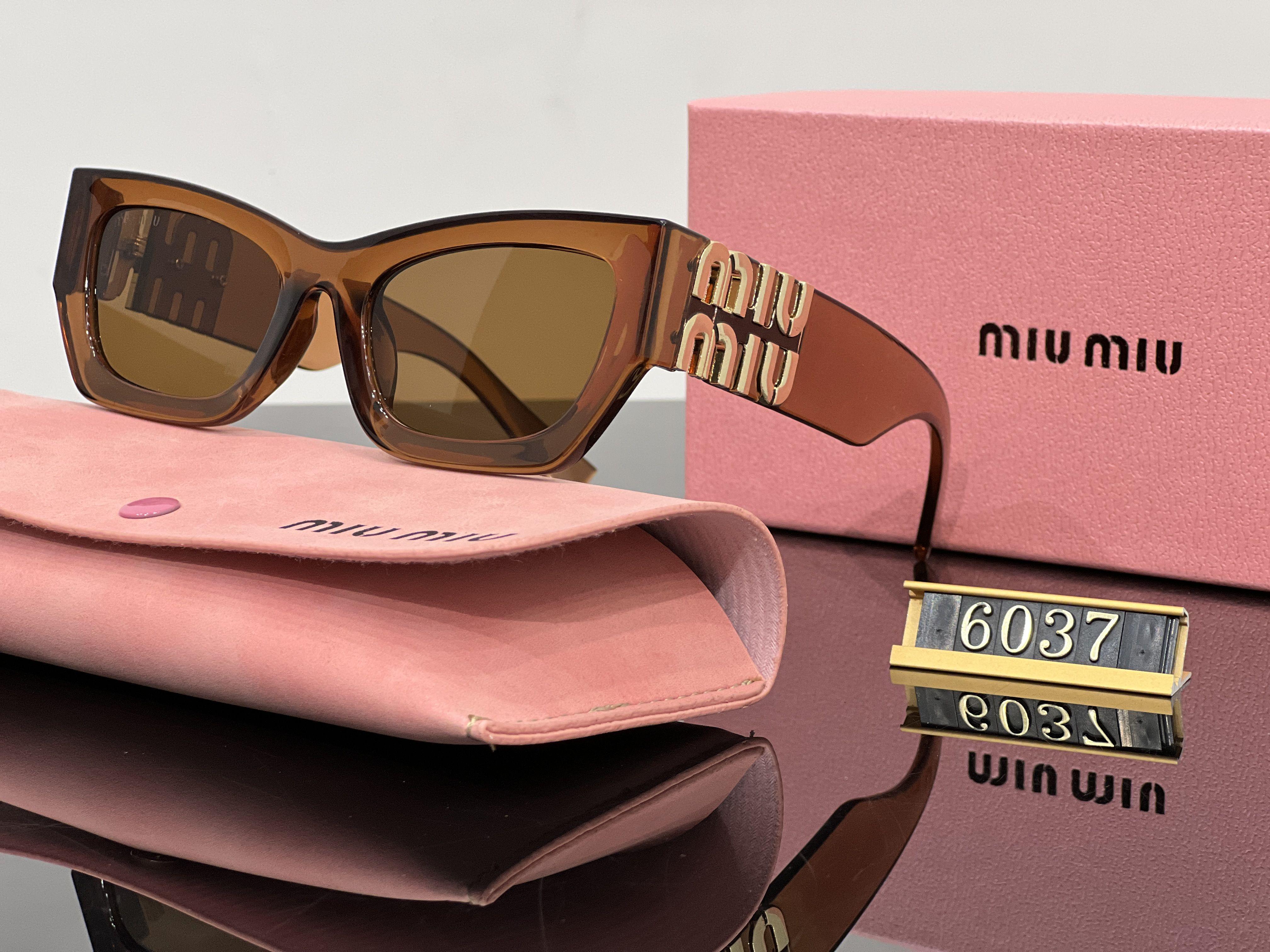 Miu Miu minimalist sunglasses