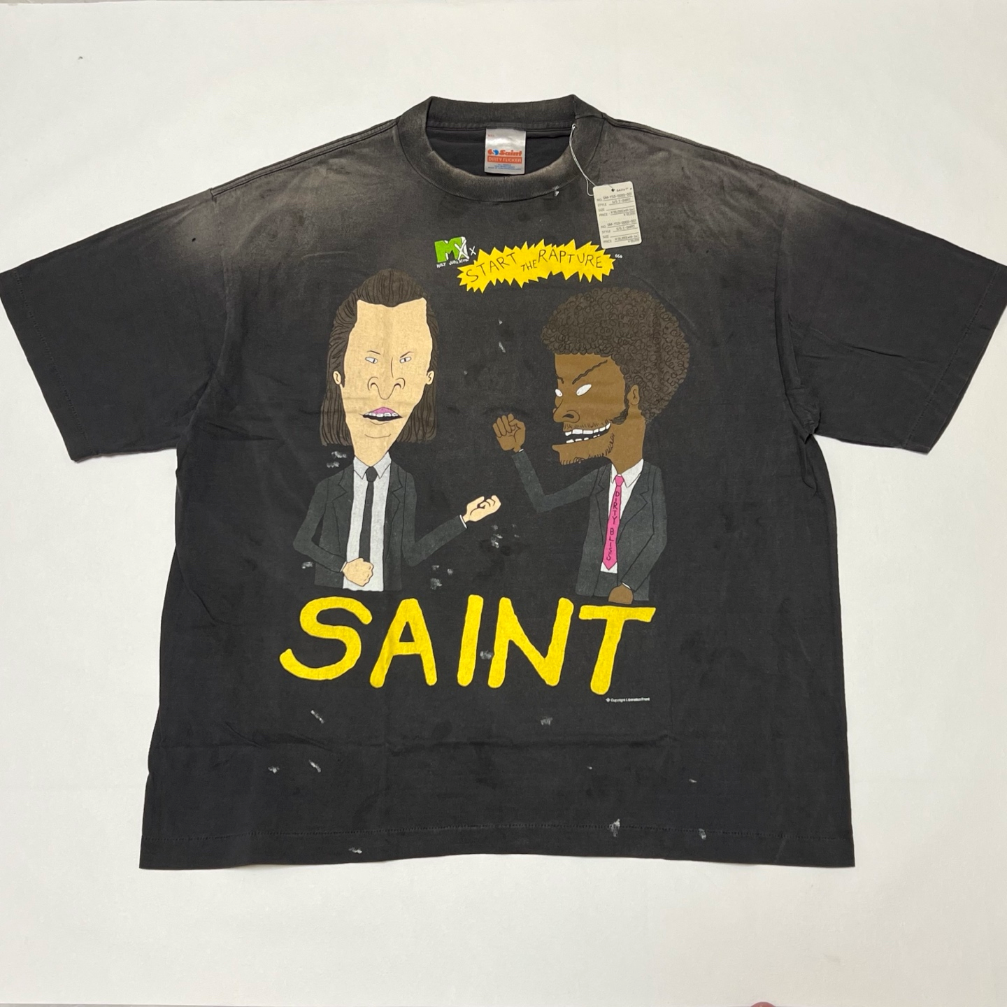 1:1 cartoon character print with a distressed finish on a short-sleeved shirt featuring a scene of an argument