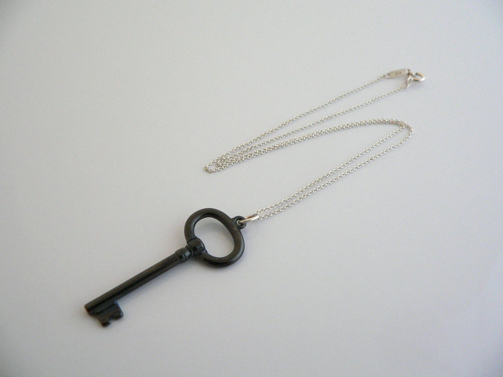 Tiffany & Co Silver Oval Black Titanium Key Necklace Pendant Chain Gift 17 Inch