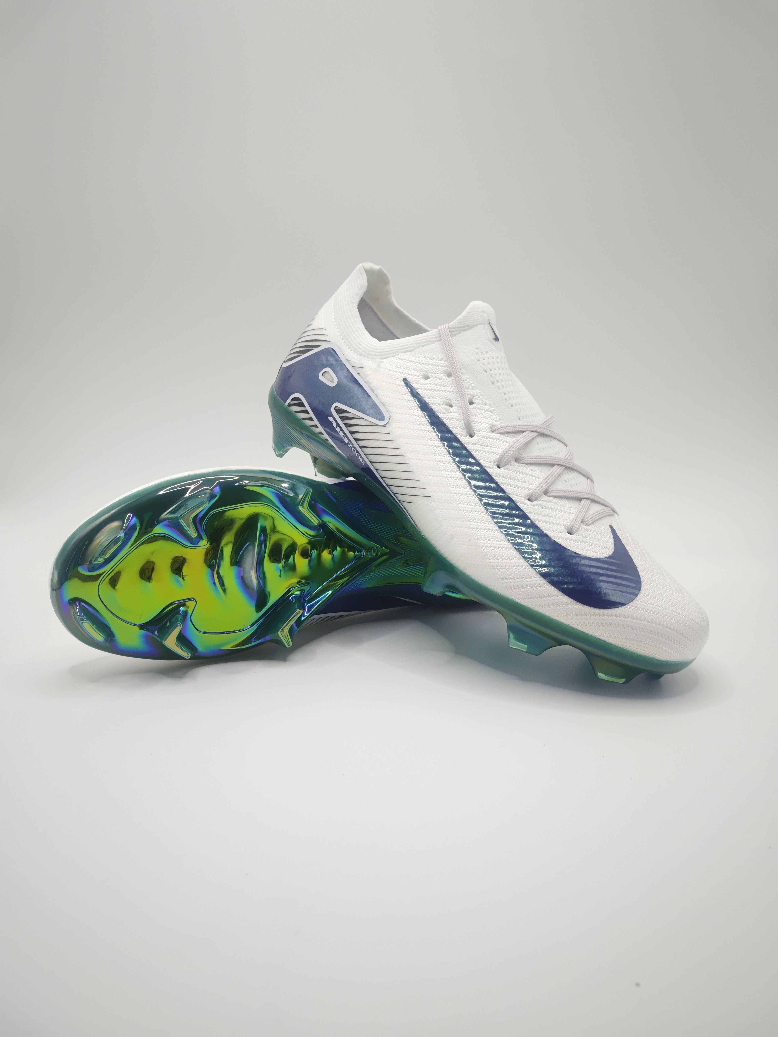 Nike Mercurial 16 FG Soccer Cleats with Built-in Bonded Pack: Full Air Cushion for All-Game Comfort, Waterproof Knit for Rainy Fields