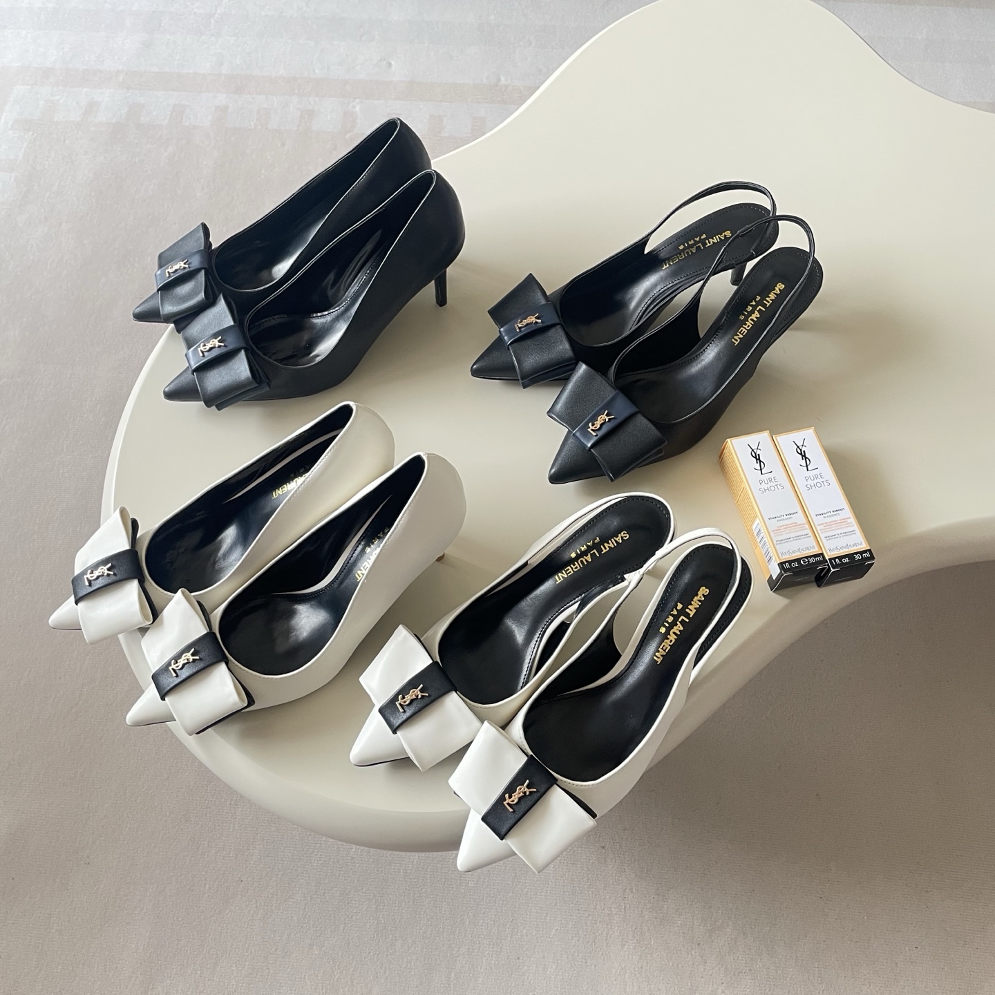 Saint Laurent YSL Logo Bow Pointed-Toe Pumps