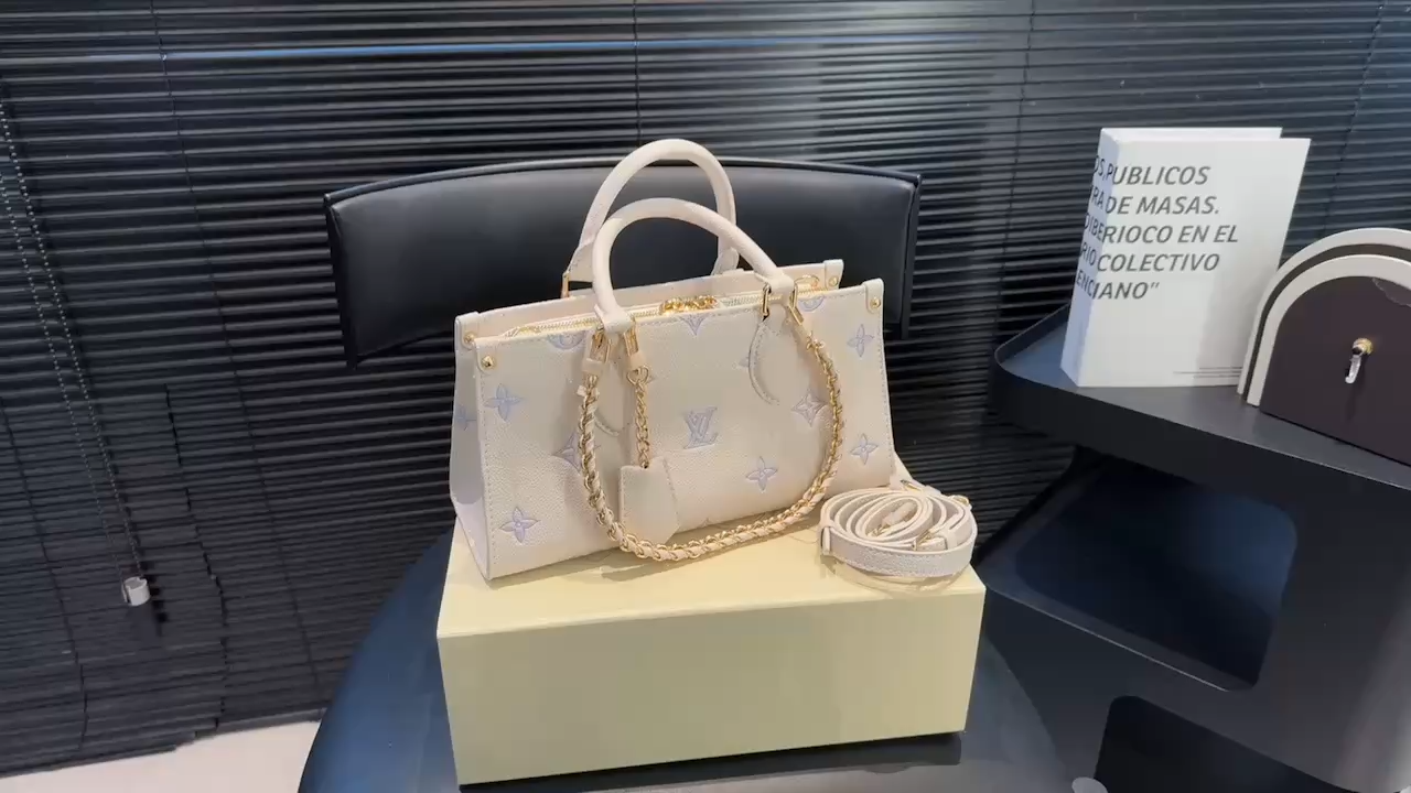 LV OnTheGo East West Bag