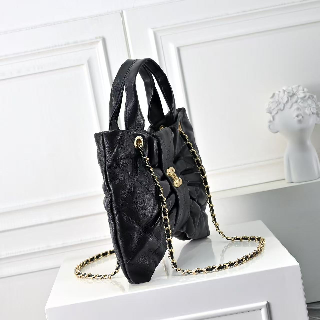 Chanel bow-design waxed lambskin leather handbag
