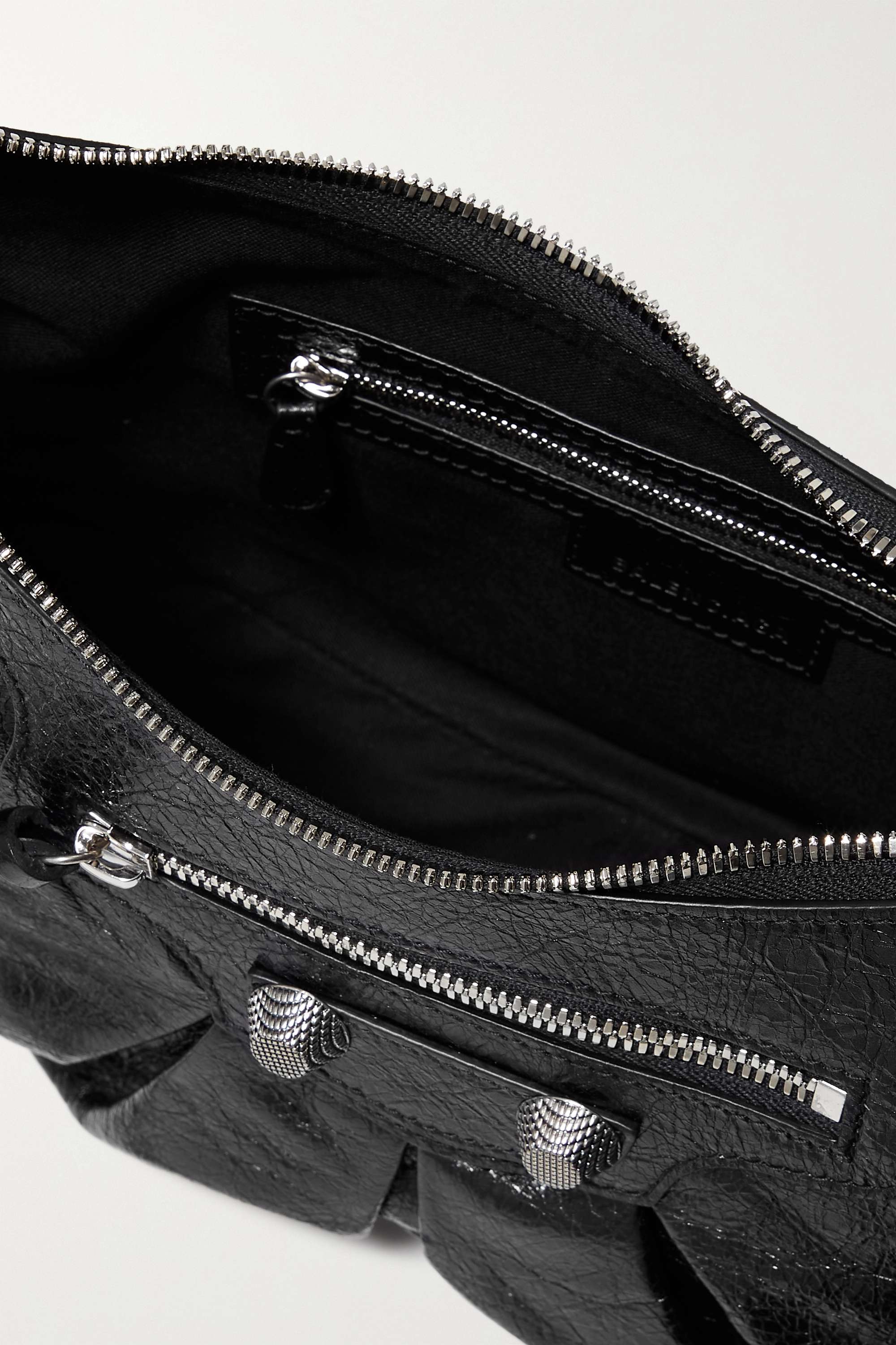 BALENCIAGA Le Cagole small studded crinkled-leather shoulder bag