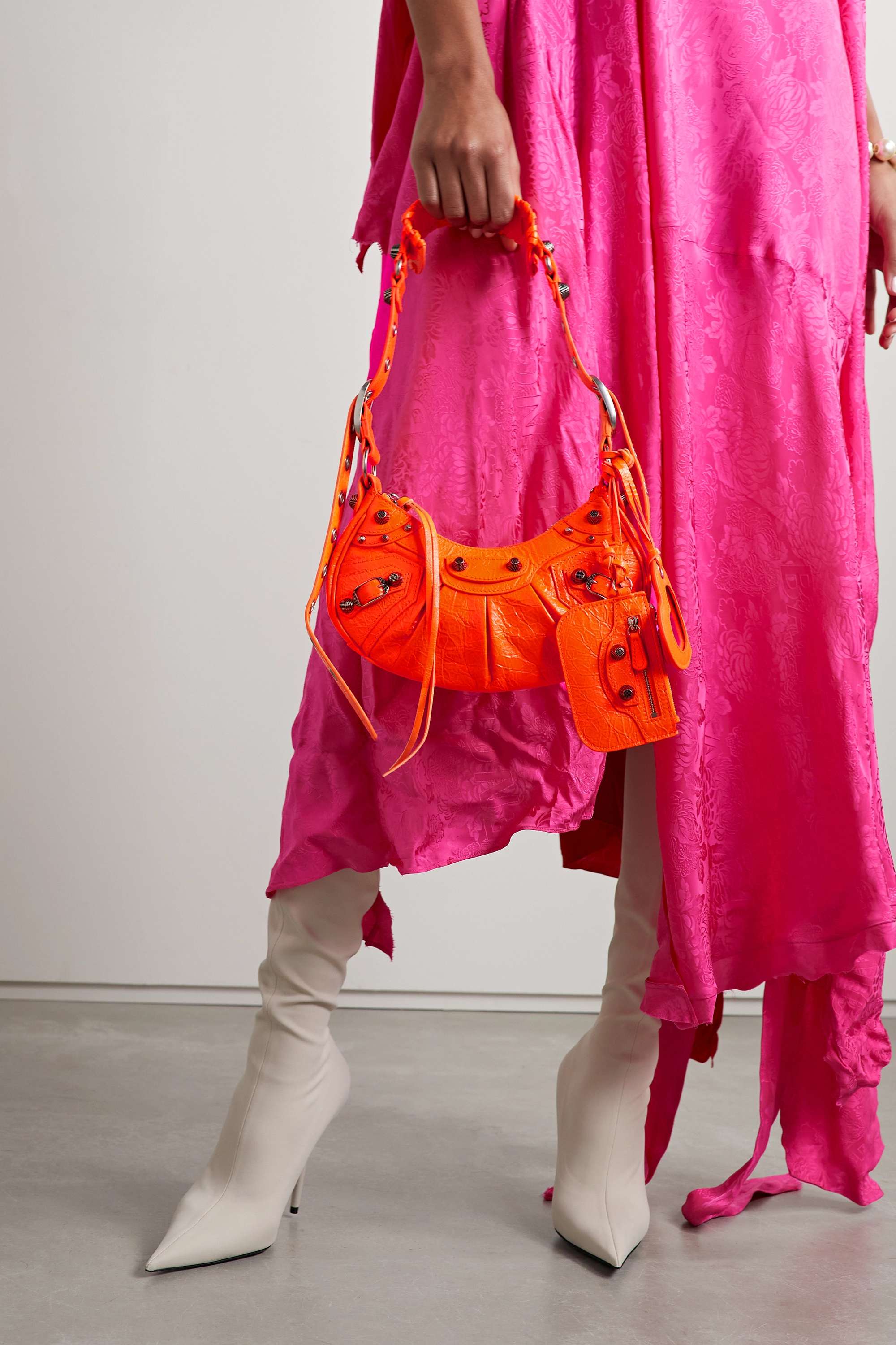 Balenciaga Le Cagole XS studded neon crinkled-leather shoulder bag organe
