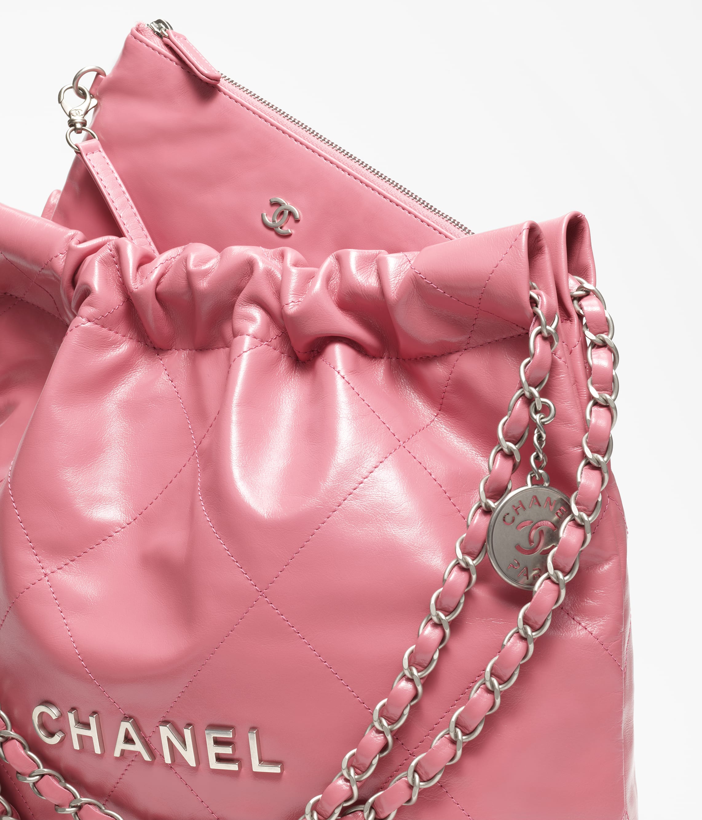 CHANEL 22 SMALL HANDBAG Calfskin & Silver Metal Pink