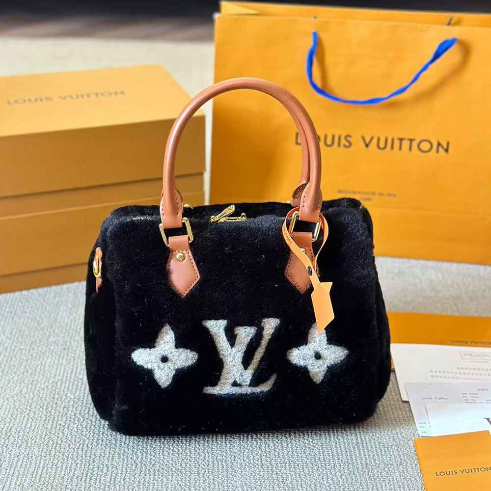 Louis Vuitton wool lamb bag