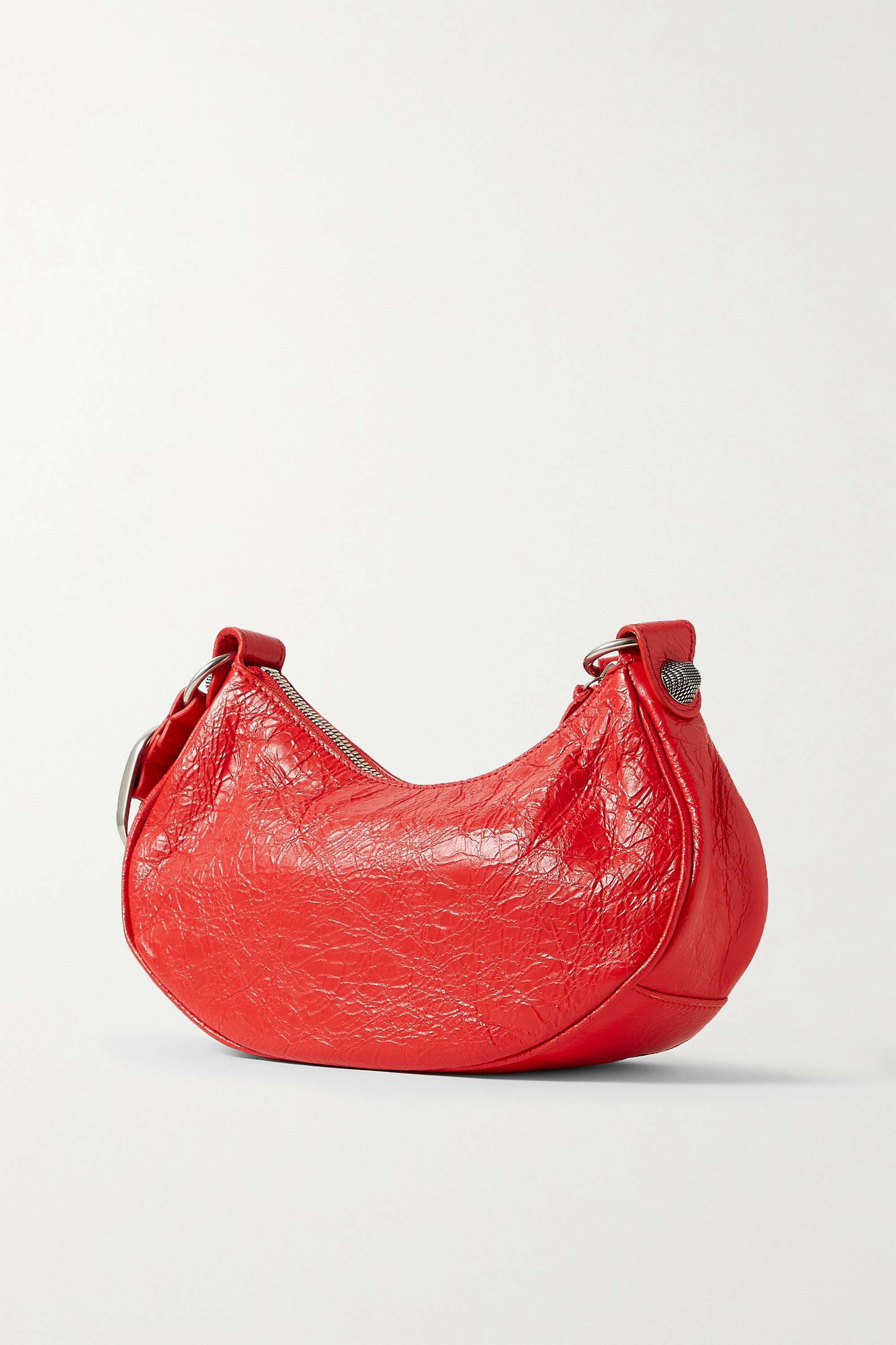BALENCIAGA Le Cagole XS studded crinkled-leather shoulder bag red
