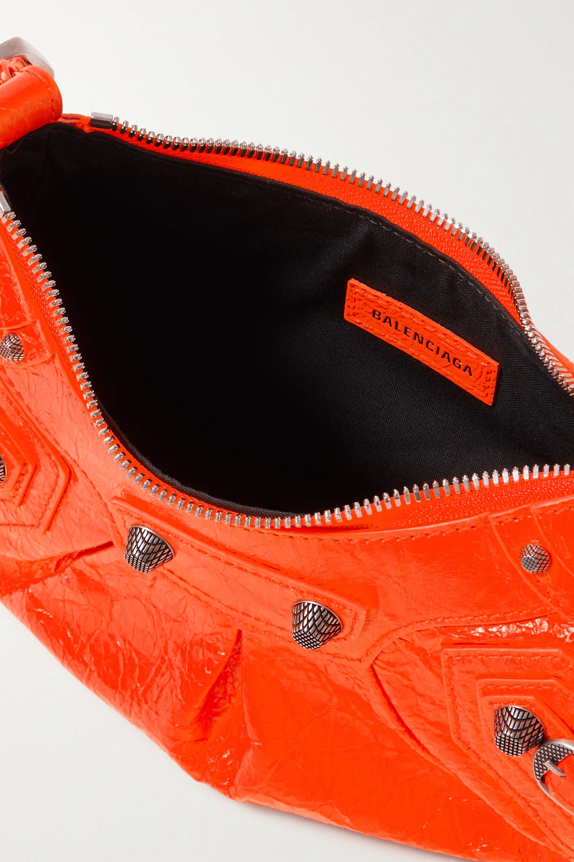 Balenciaga Le Cagole XS studded neon crinkled-leather shoulder bag organe