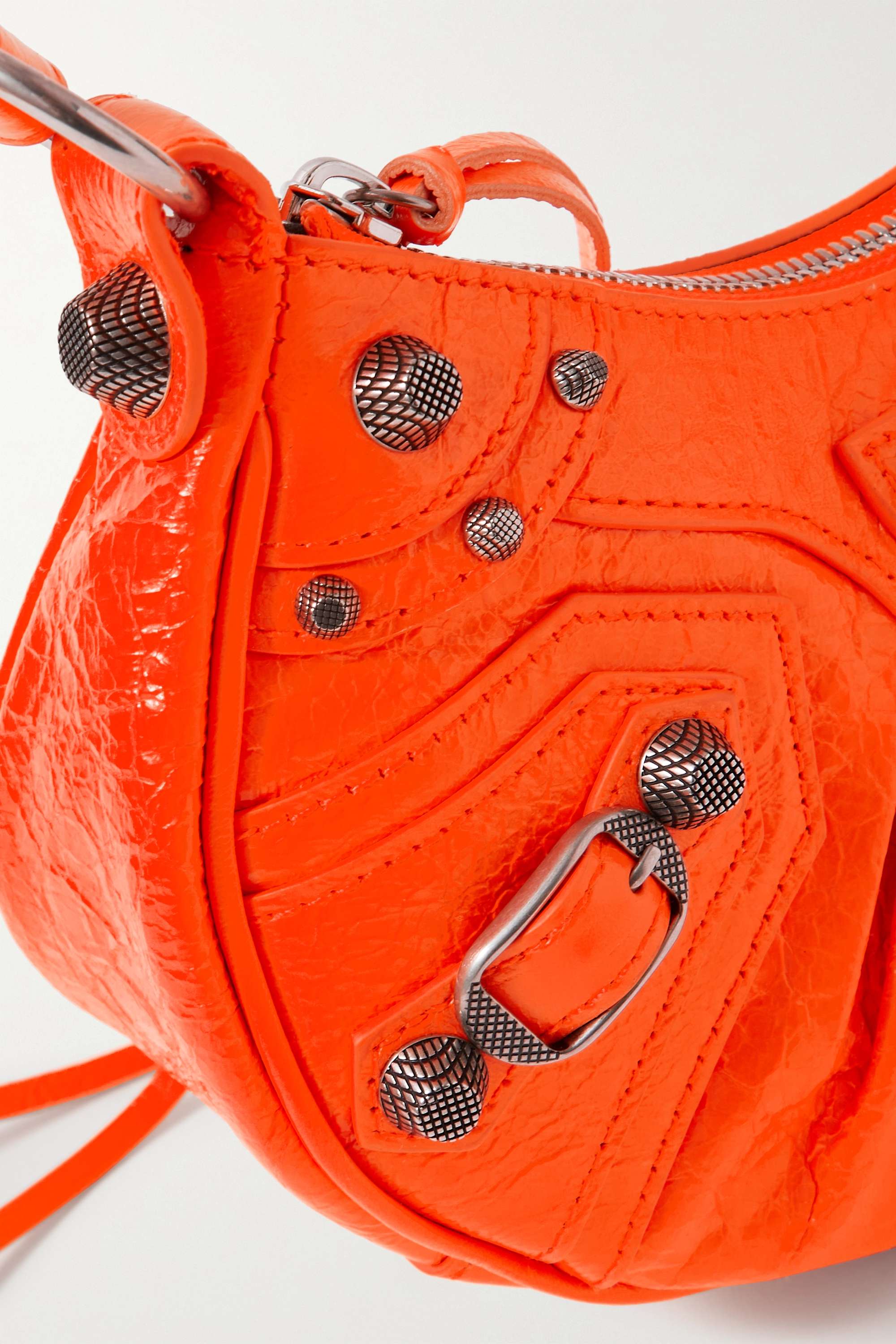 Balenciaga Le Cagole XS studded neon crinkled-leather shoulder bag organe