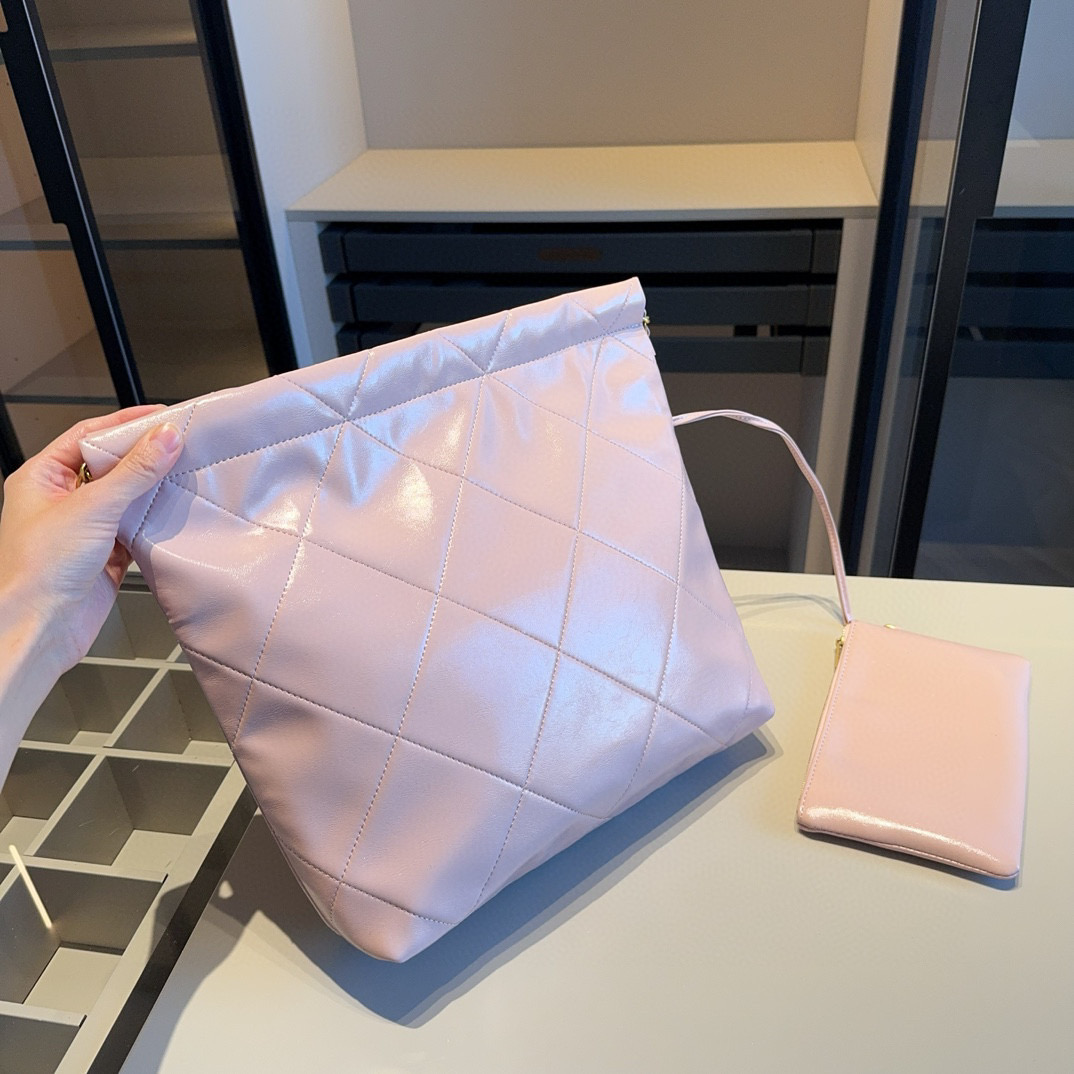 CHANEL 22 SMALL HANDBAG Calfskin & Gold Metal Pink