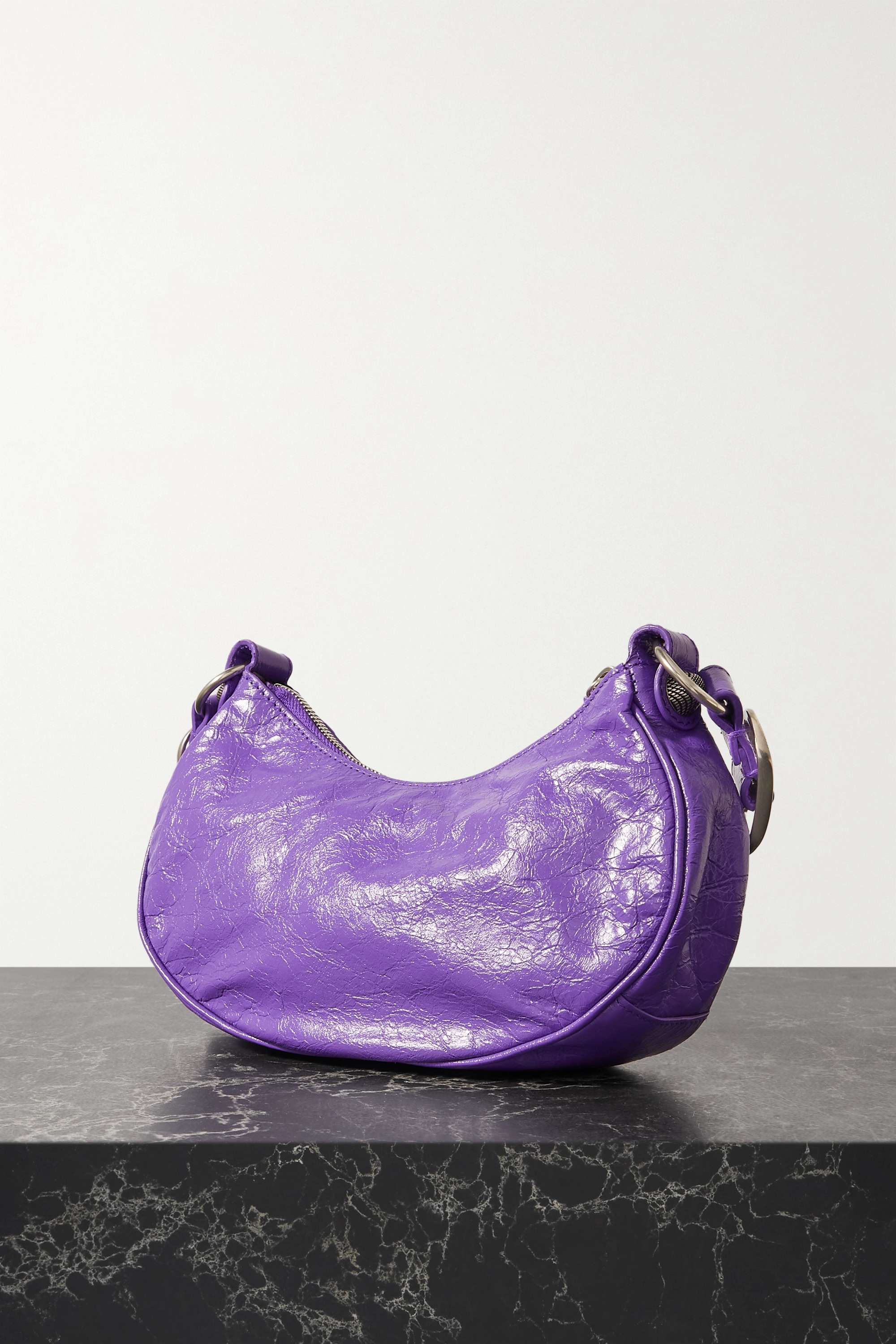 BALENCIAGA Le Cagole XS studded crinkled-leather shoulder bag purple
