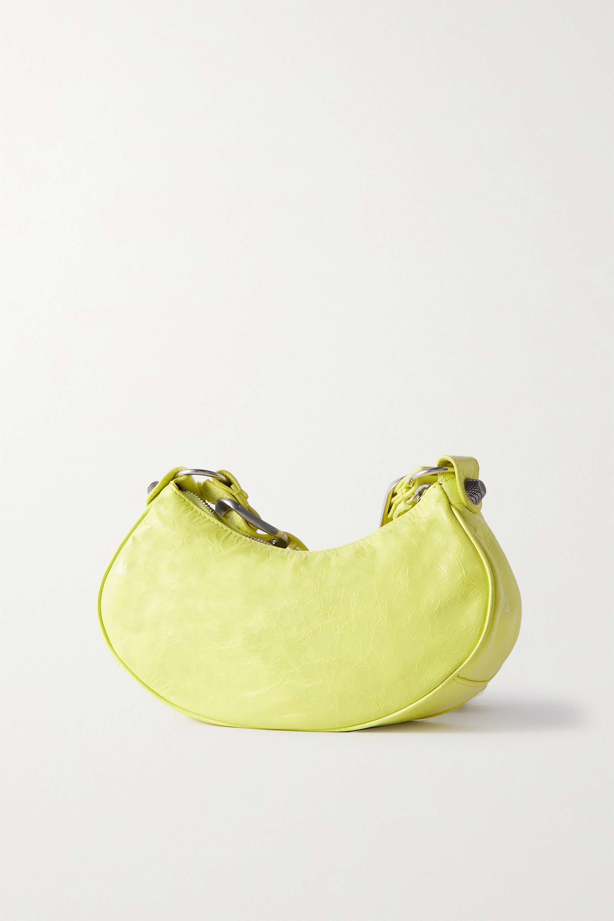 BALENCIAGA Le Cagole XS studded crinkled-leather shoulder bag yellow