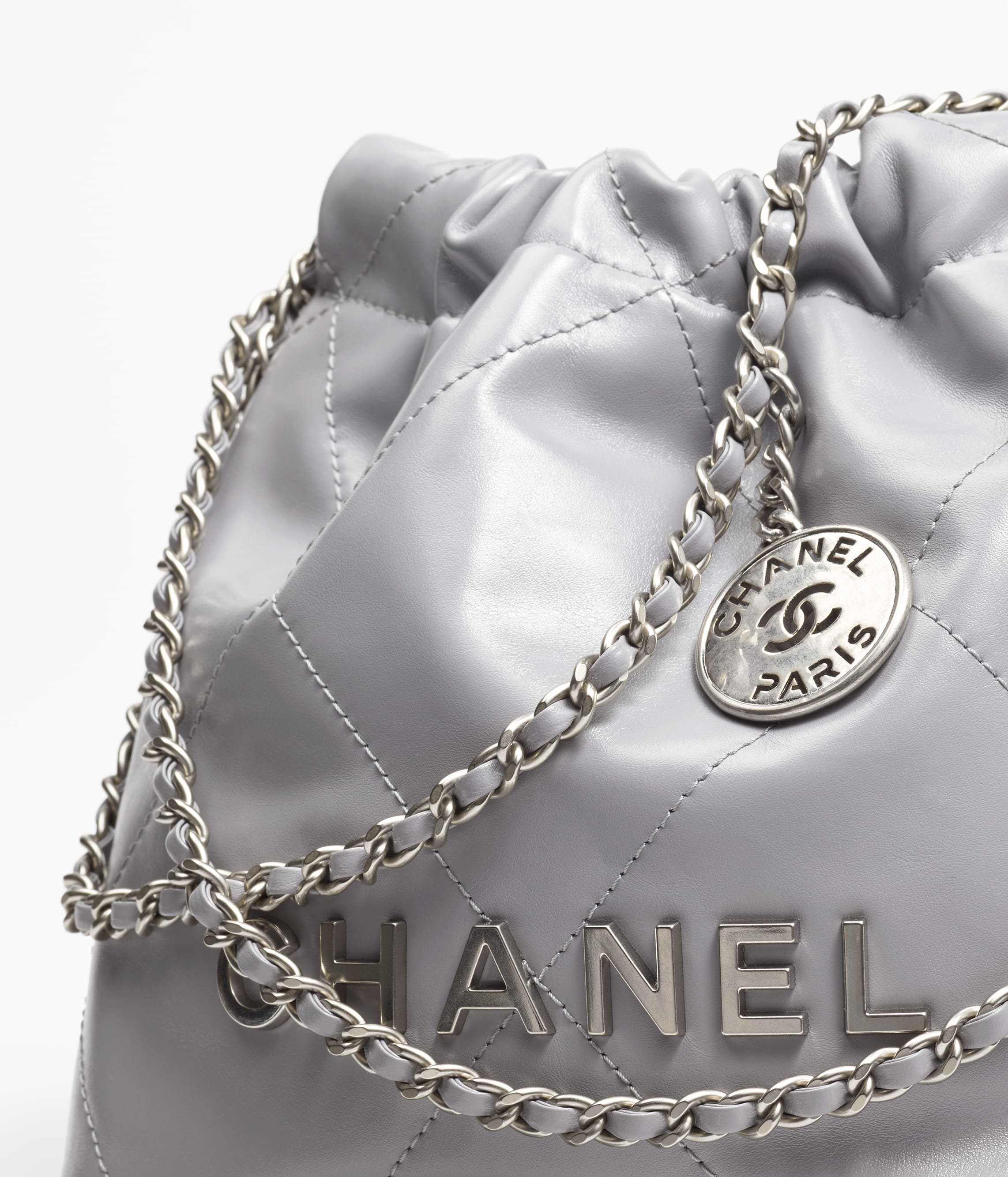 CHANEL 22 MINI HANDBAG Calfskin & Silver Metal Grey