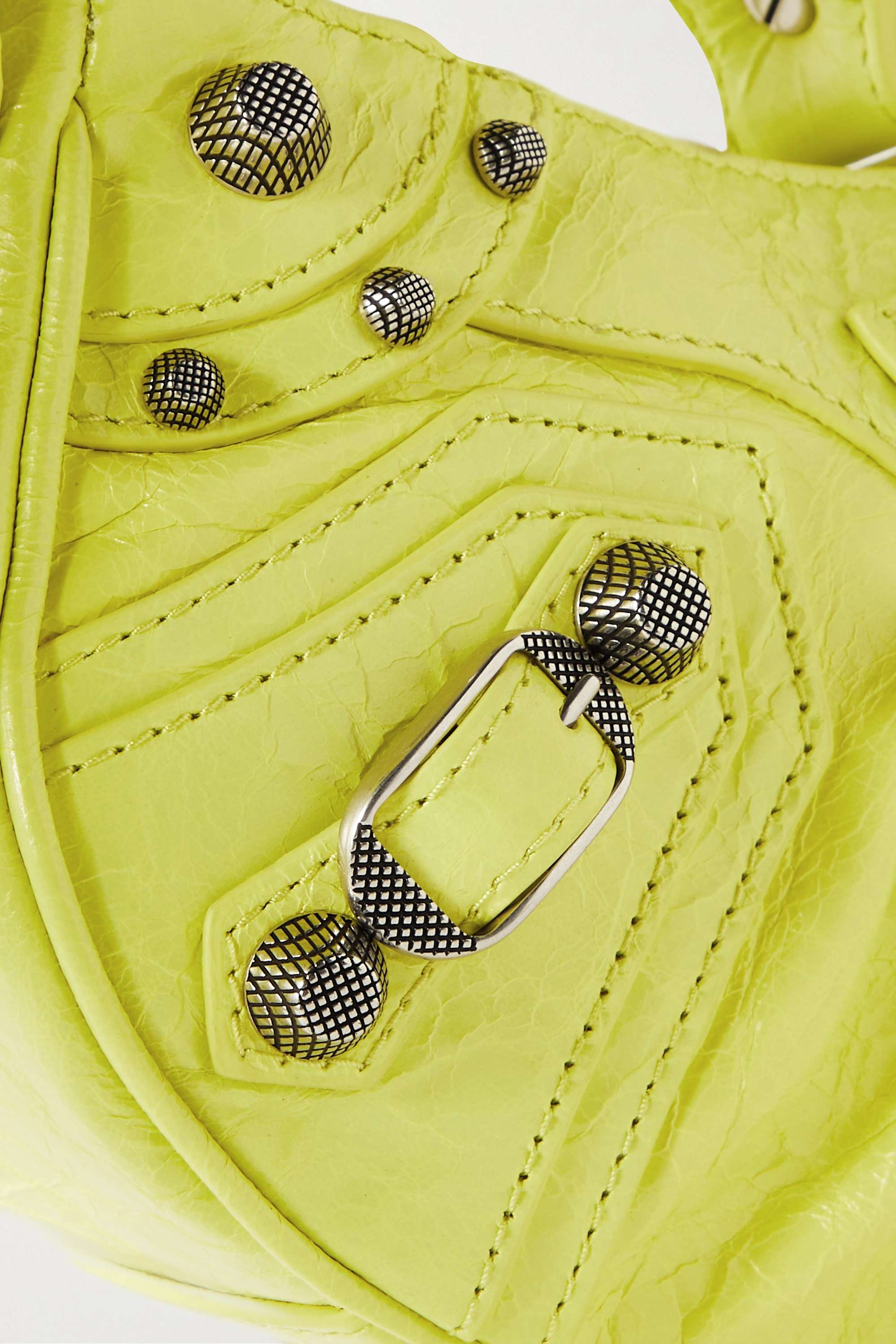 BALENCIAGA Le Cagole XS studded crinkled-leather shoulder bag yellow