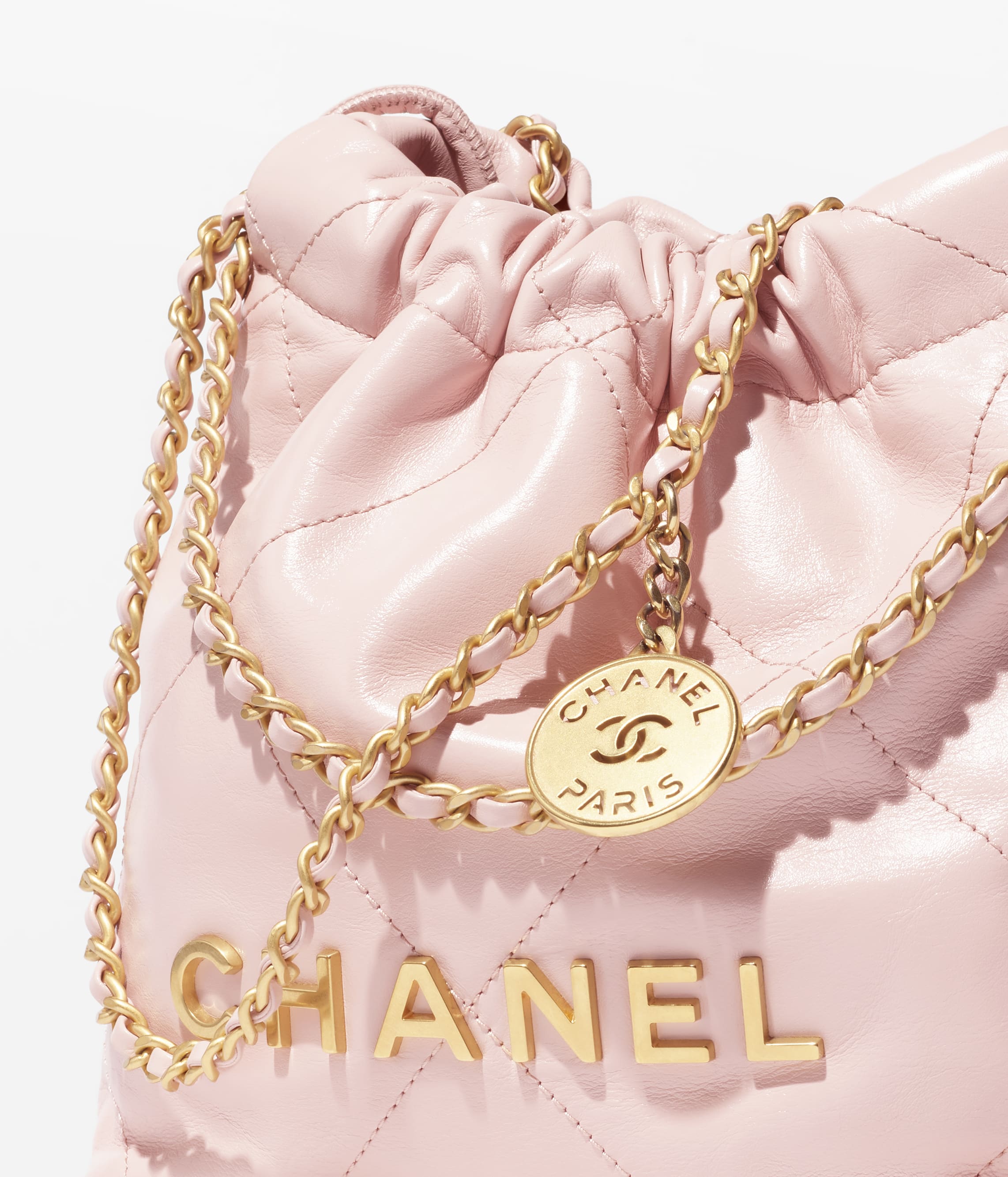 CHANEL 22 MINI HANDBAG Shiny Calfskin & Gold-Tone Metal Light Pink