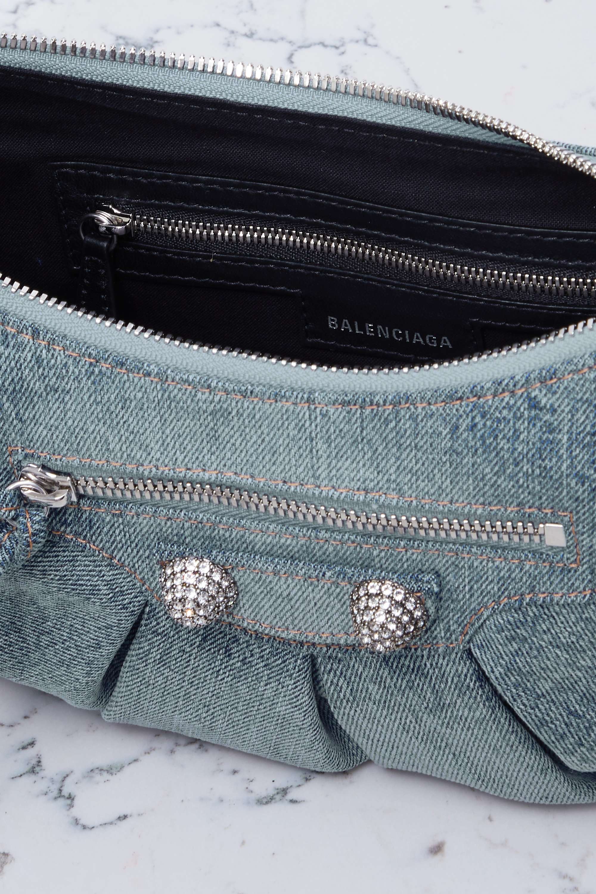 BALENCIAGA Le Cagole small embellished denim shoulder bag