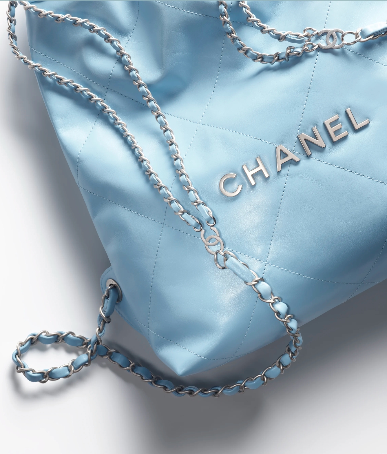 CHANEL 22 BACKPACK Calfskin & Silver Metal Light Blue