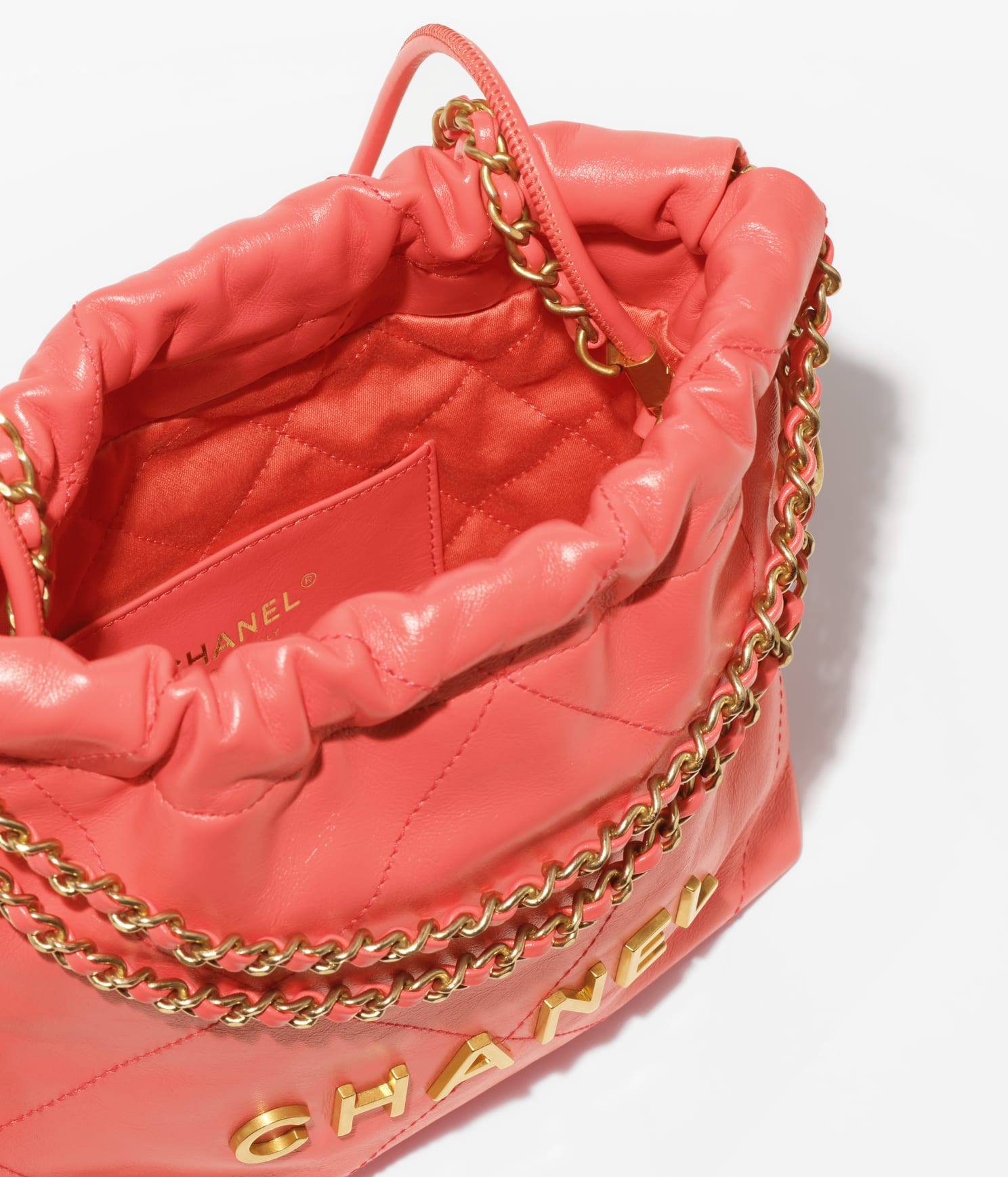 CHANEL 22 MINI HANDBAG Shiny Calfskin & Gold-Tone Metal Coral