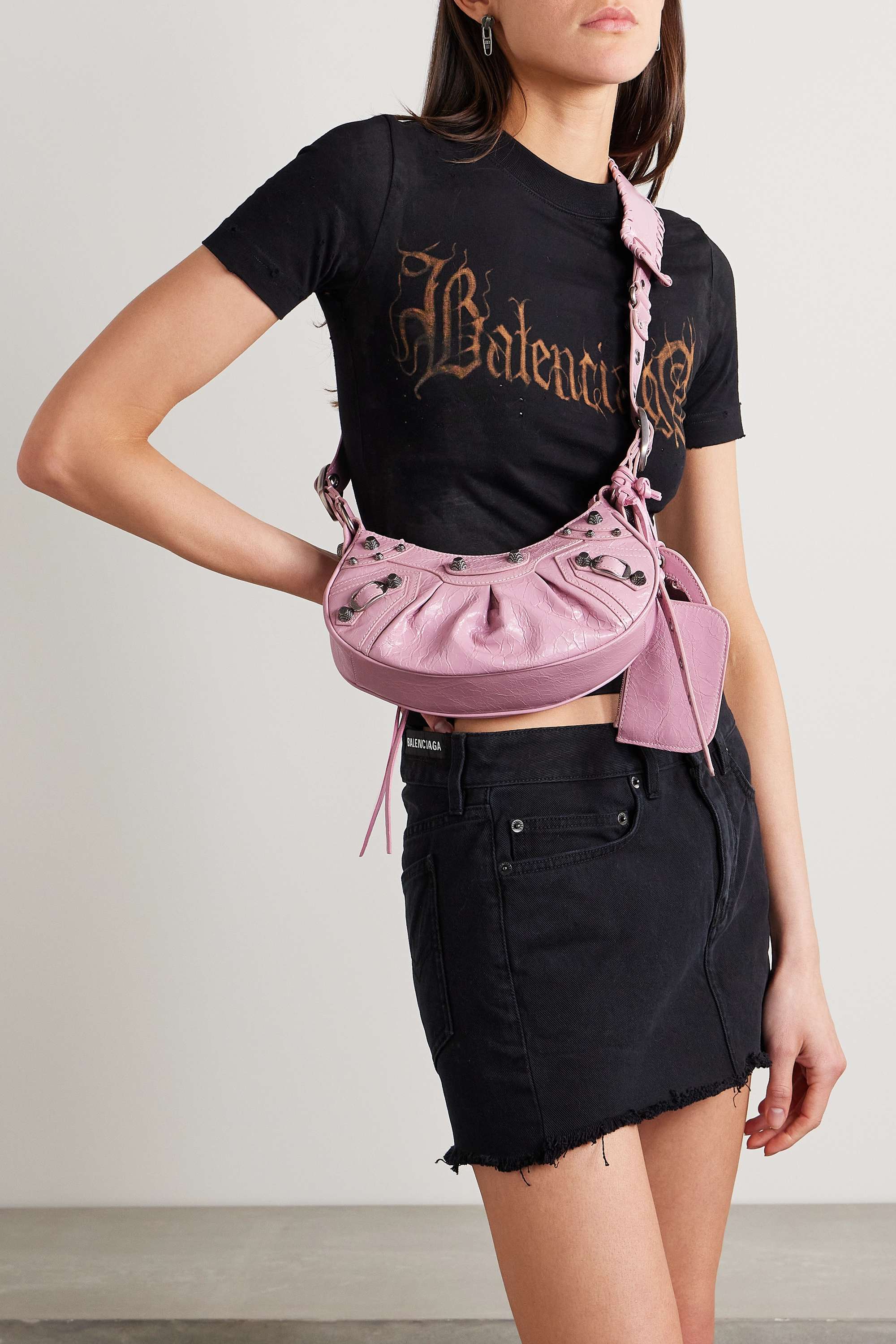 BALENCIAGA Le Cagole XS studded crinkled-leather shoulder bag pink