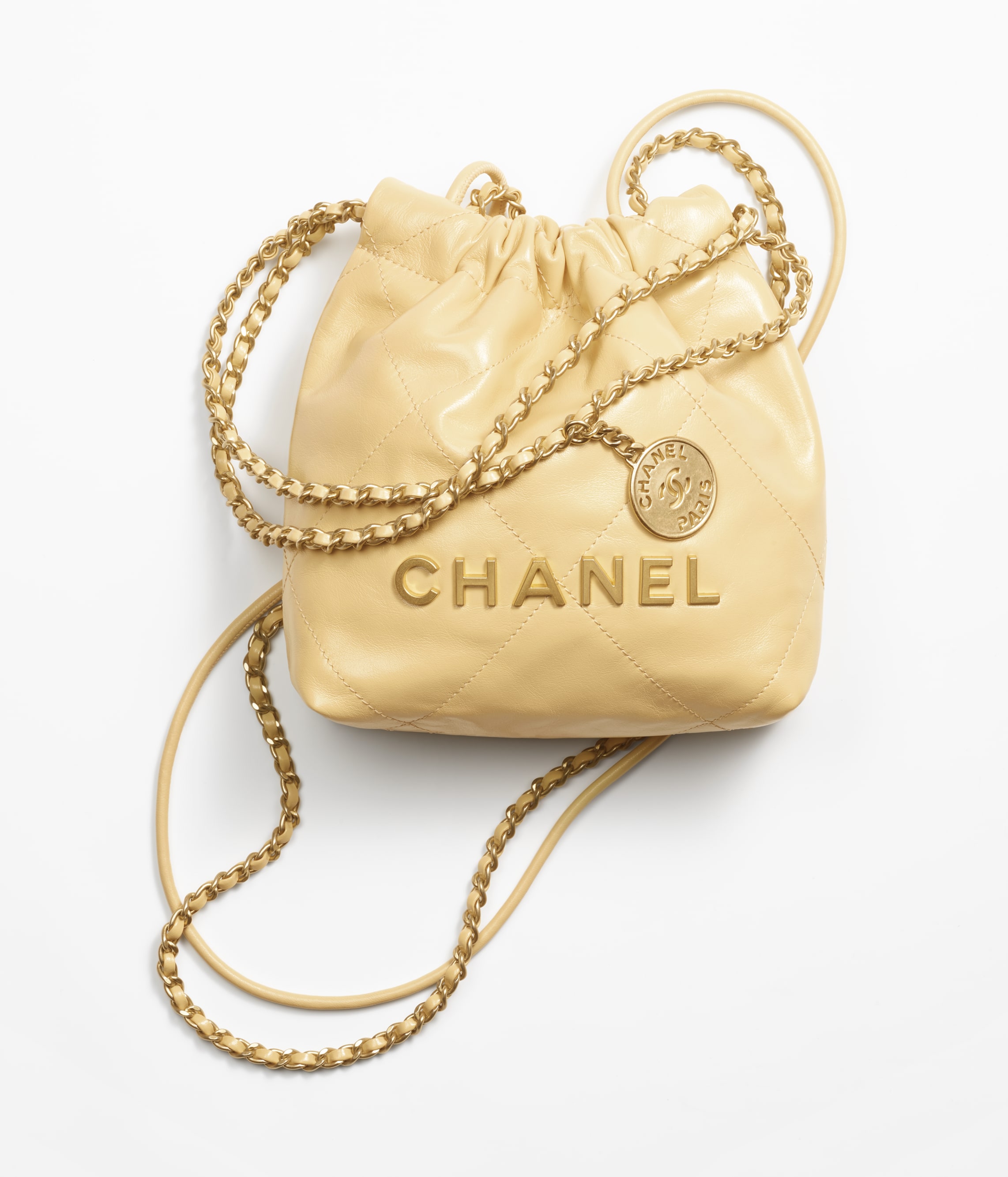 CHANEL 22 MINI HANDBAG Shiny Calfskin & Gold-Tone Metal Yellow