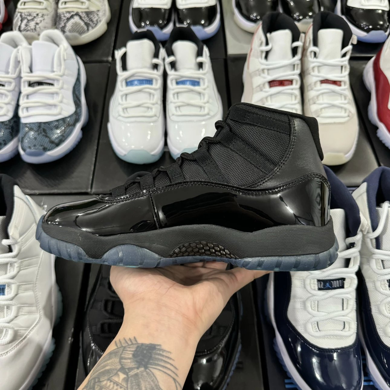 Air Jordan 11 Retro High Black with Sky Blue Logo