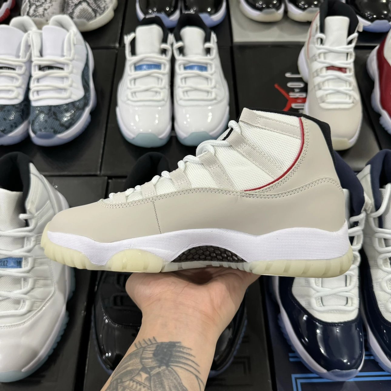 Air Jordan 11 Retro High Beige with Red Logo