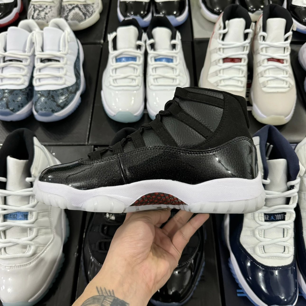 Air Jordan 11 Retro High Black Leather with Red Logo