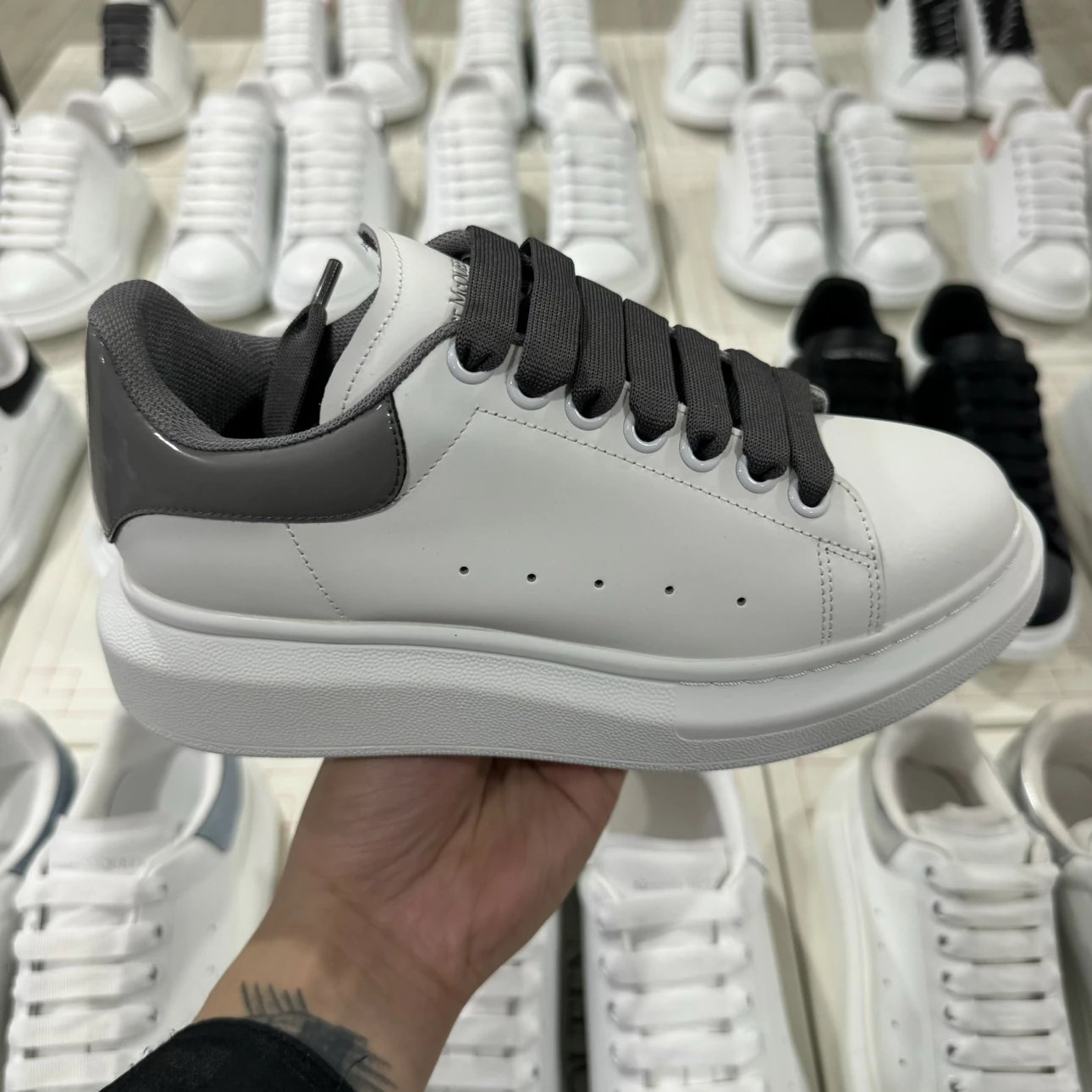 Alexander McQueen dark grey and white shoes