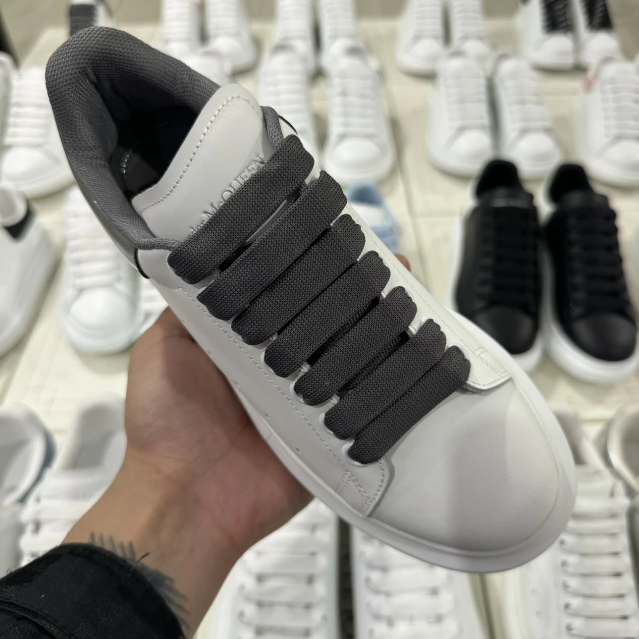 Alexander McQueen dark grey and white shoes