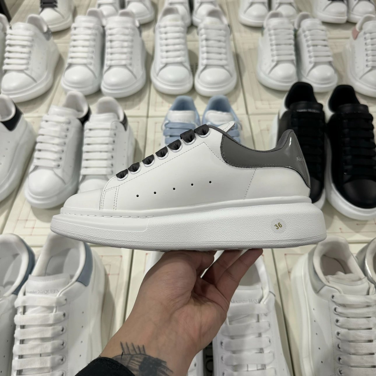 Alexander McQueen dark grey and white shoes