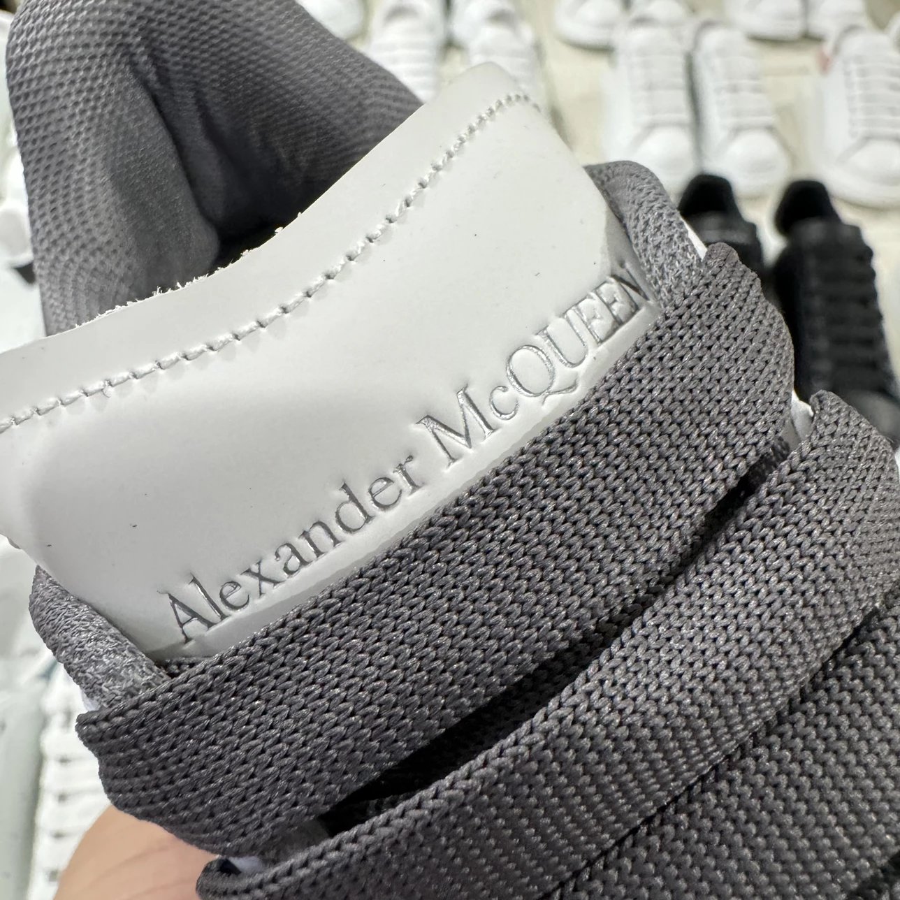 Alexander McQueen dark grey and white shoes