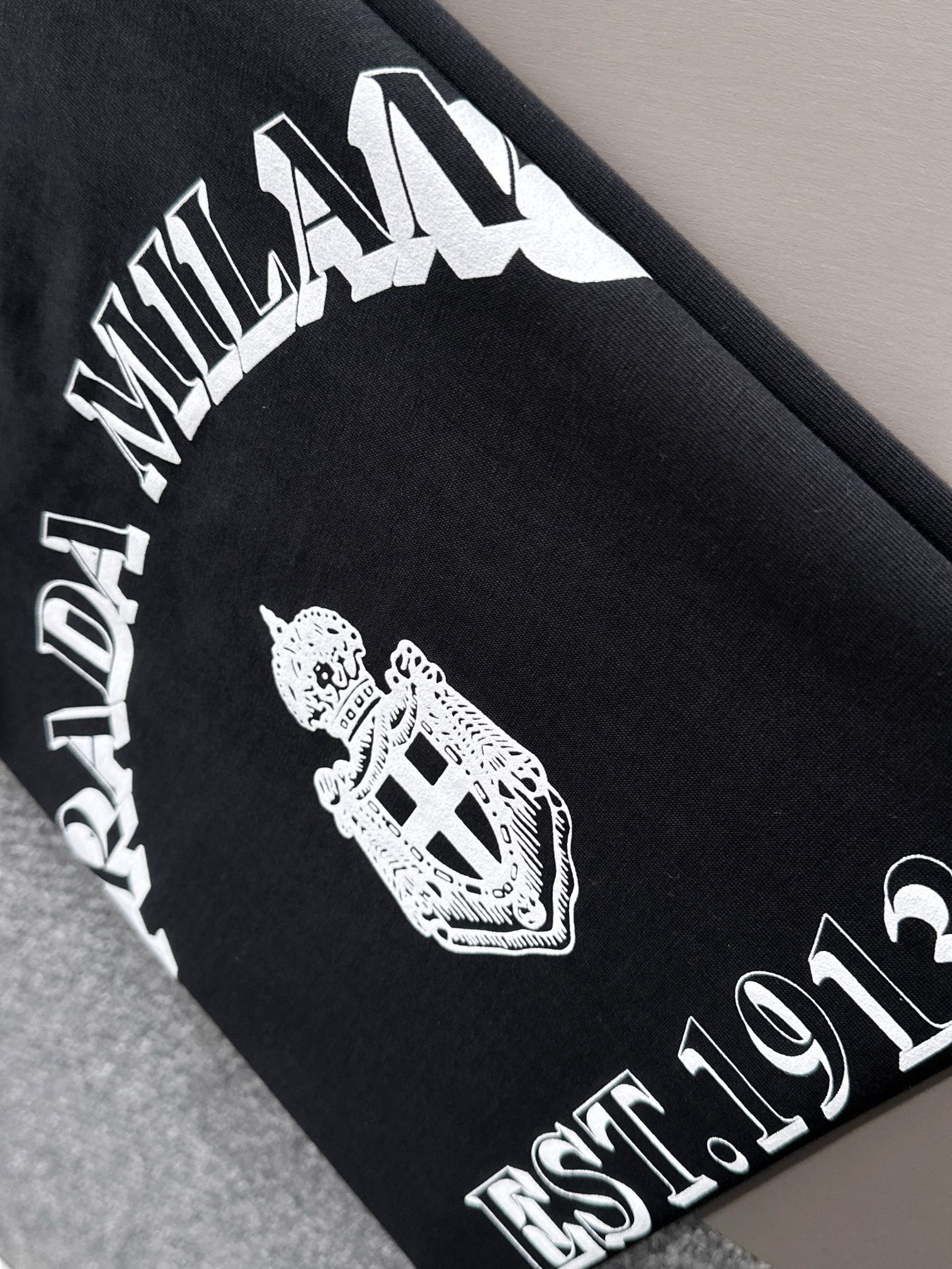 Prada 2025 milano logo black and white tee